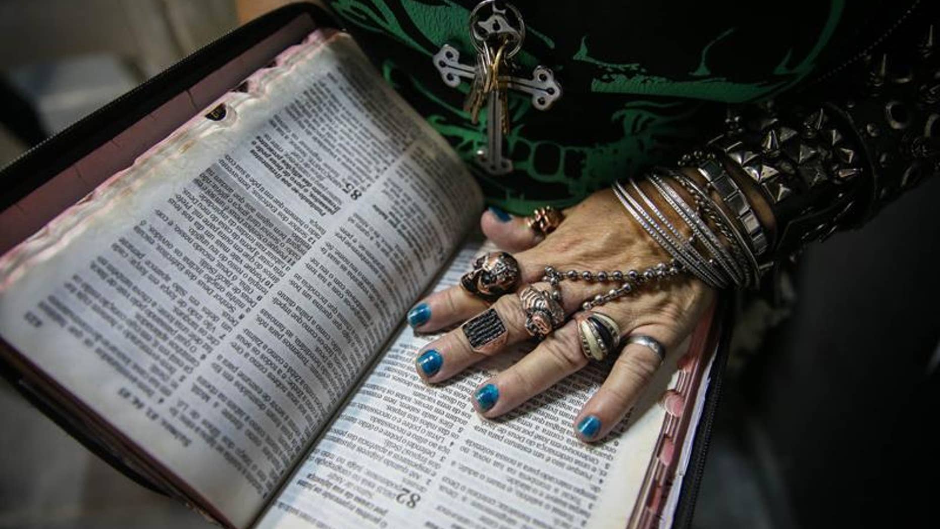 Woman attending worship at the Crash Church in Sao Paulo, Brazil, on Jan. 8, 2017.