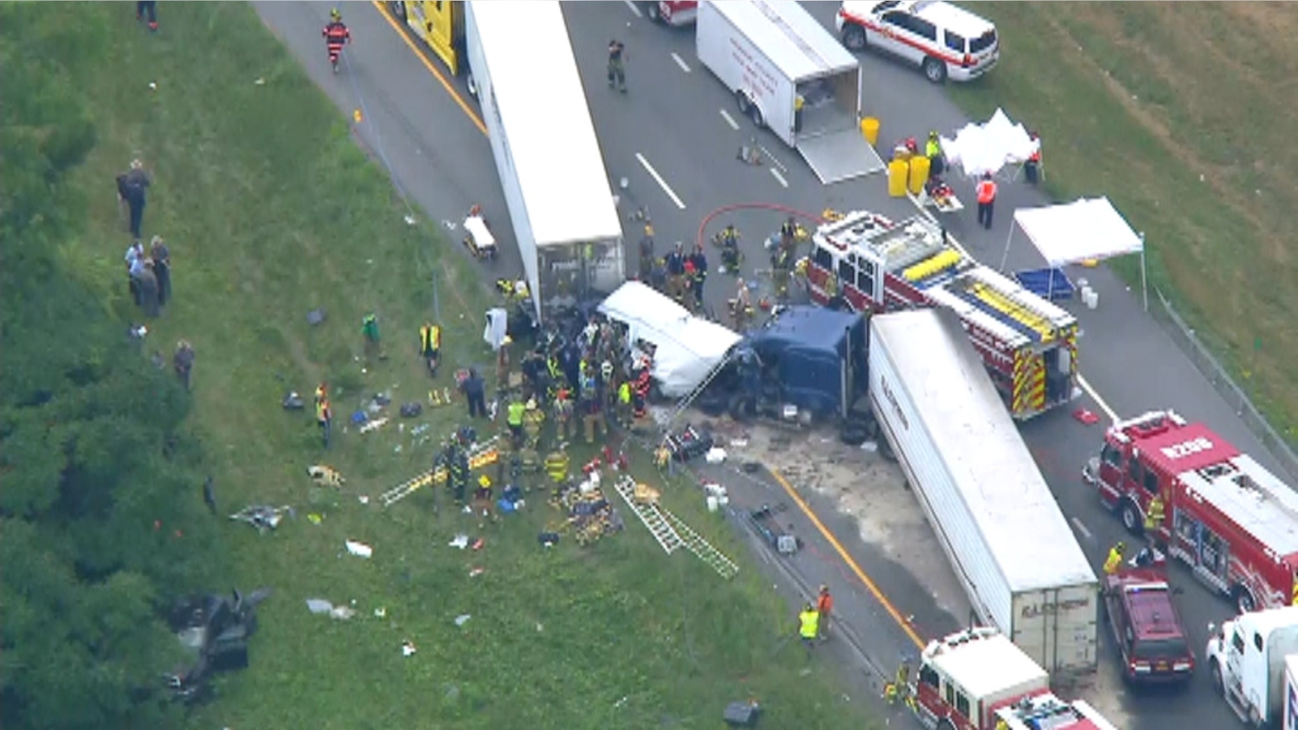 At least one person was reported dead in a multi-vehicle wreck.