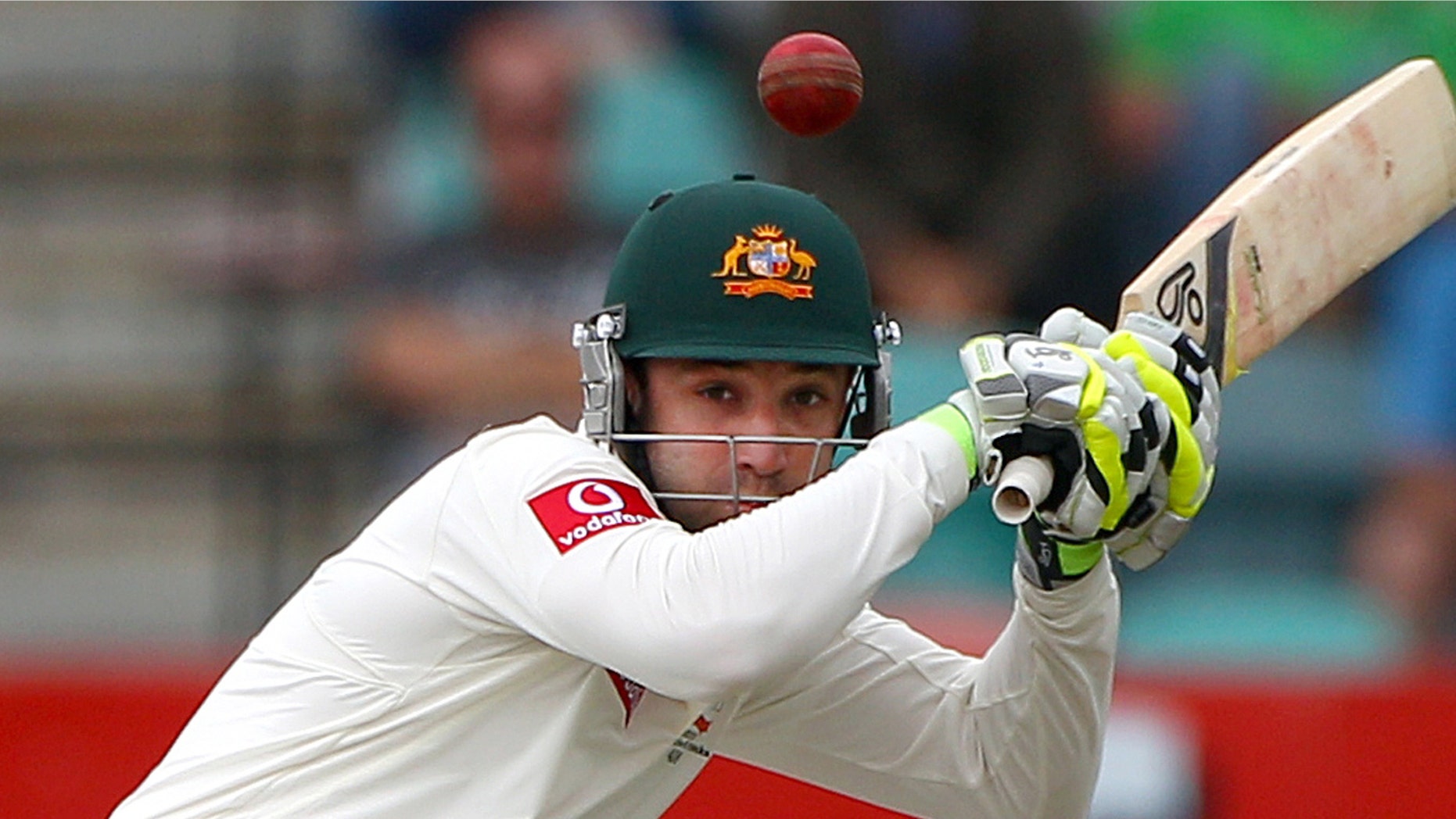 Dec. 14, 2014: Australia's Phil Hughes ducks under a bouncer from Sri Lanka's Shaminda Eranga on the first day of their cricket test match at Bellerive Oval in Hobart