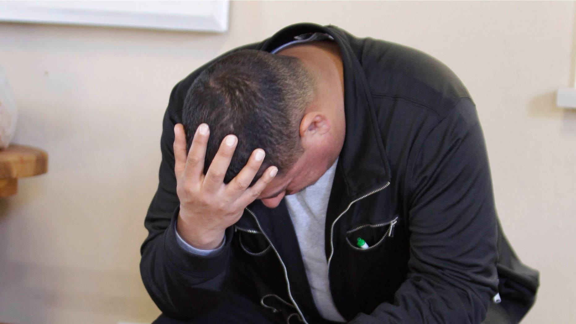 In this Feb. 1, 2011 photo, unemployed Jorge Garcia waits for work at the Day Worker Center of Mountain View in Mountain View, Calif. The unemployment rate dropped sharply last month to 9 percent, the lowest level in nearly two years. But the economy generated only 36,000 net new jobs, the fewest in four months.(AP Photo/Paul Sakuma)
