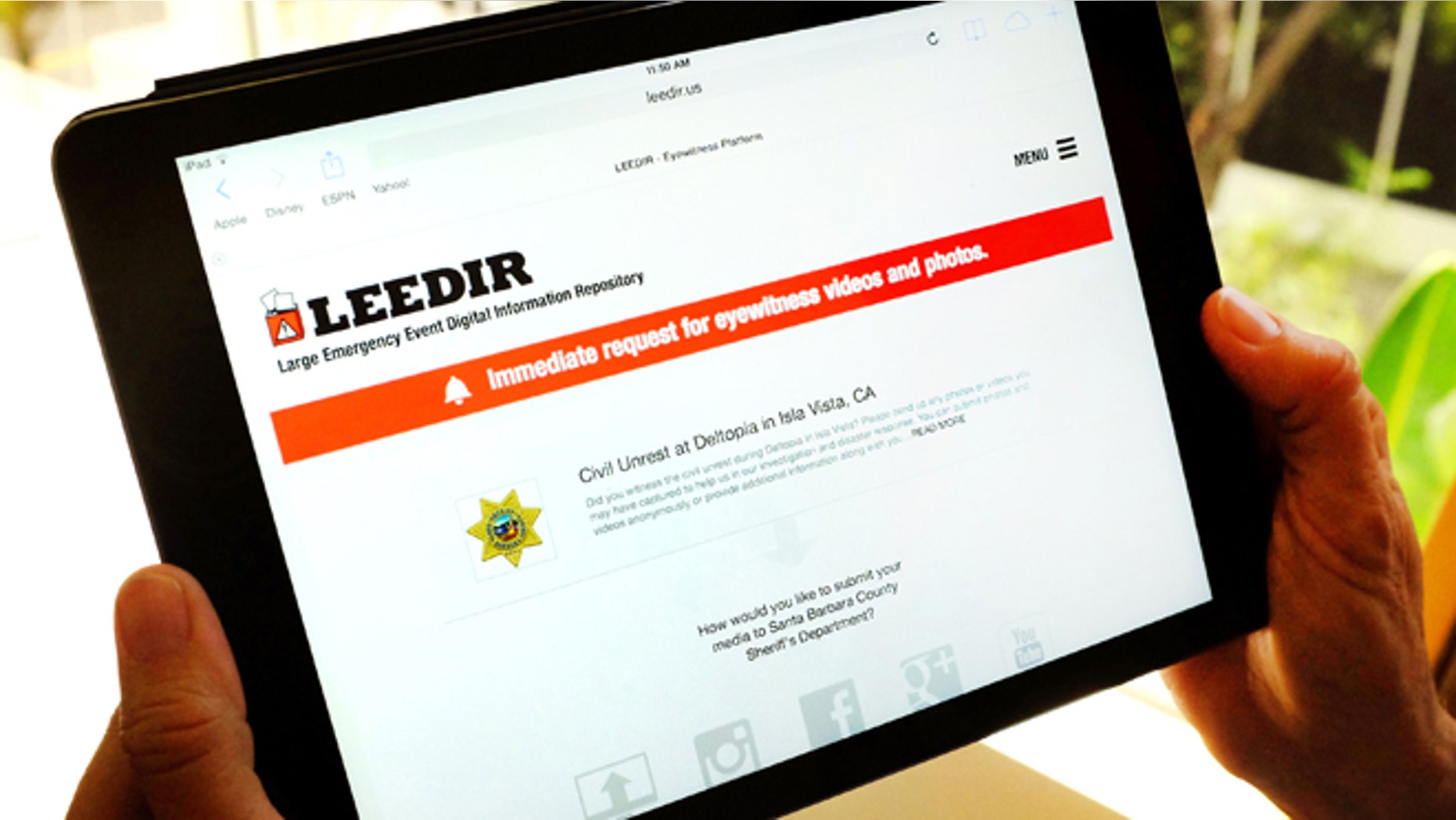 April 24, 2014: A tablet computer displays a web site for LEEDIR, or the Large Emergency Event Digital Information Repository, that aims to make use of a document-everything culture evident on Instagram, Facebook and other social media to benefit law enforcement nationwide.