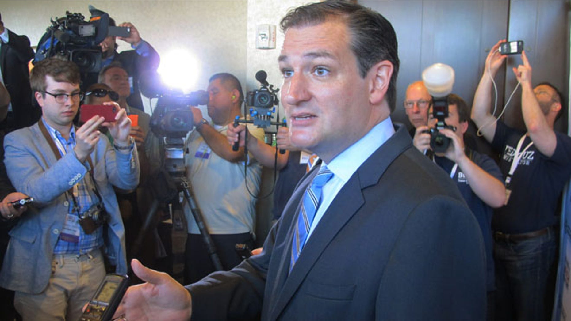 Aug 30, 2014: U.S. Sen. Ted Cruz, R-Texas, speaks to reporters after his speech at the Americans for Prosperity Summit in Dallas. (AP)
