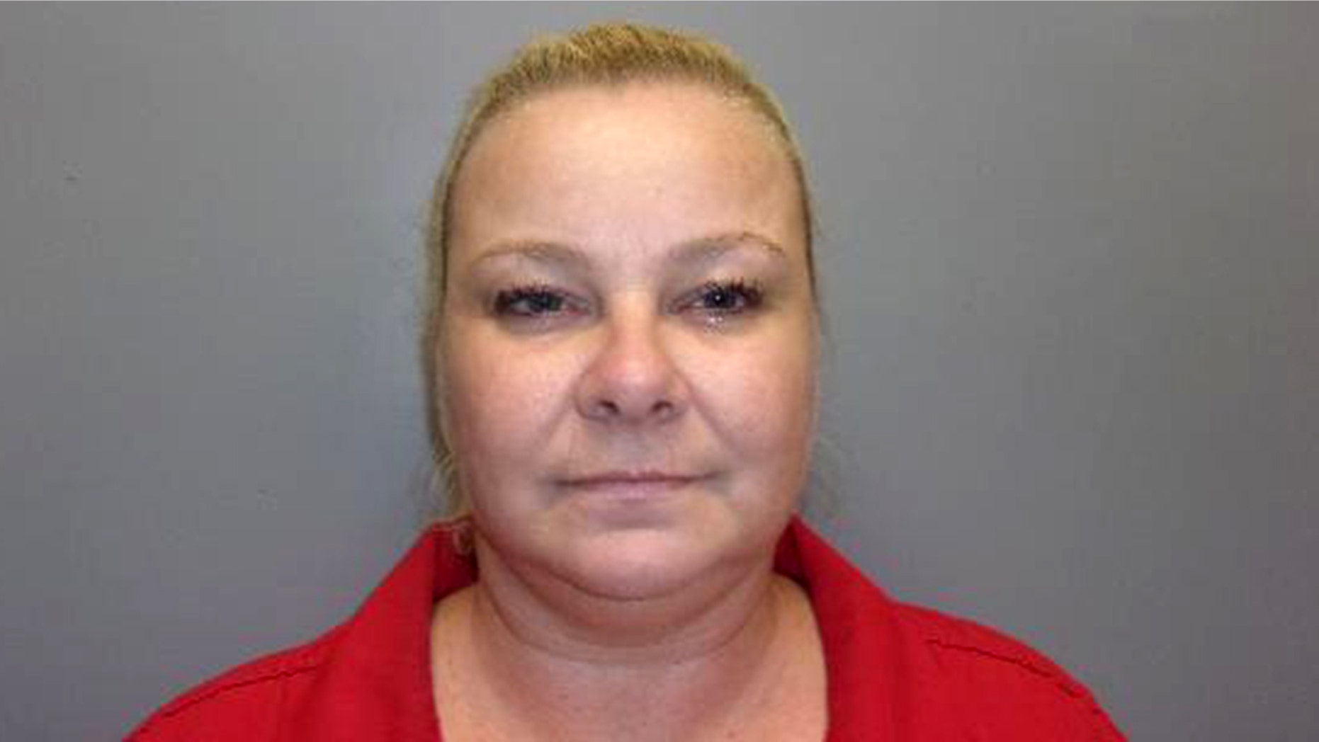 Officials said Crystelle Baton, 42, was arrested in a sting for trying to pocket a winning lottery ticket worth $600 from an unsuspecting customer who turned out to be an undercover agent.