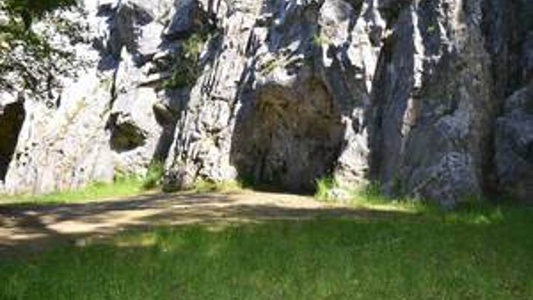 The entrance to the Troisième caverne, Belgium. An international team of researchers has identified butchered remains of Neanderthals from the cave, indicating cannibalism.