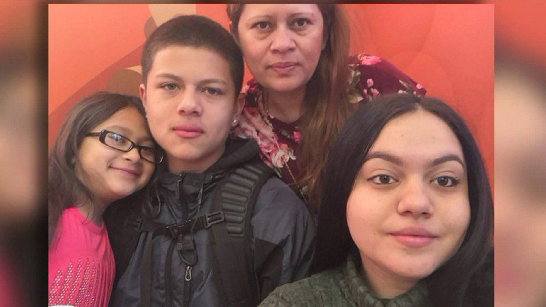 Nury Chavarria, second right, poses with three of her four children in this undated photo
