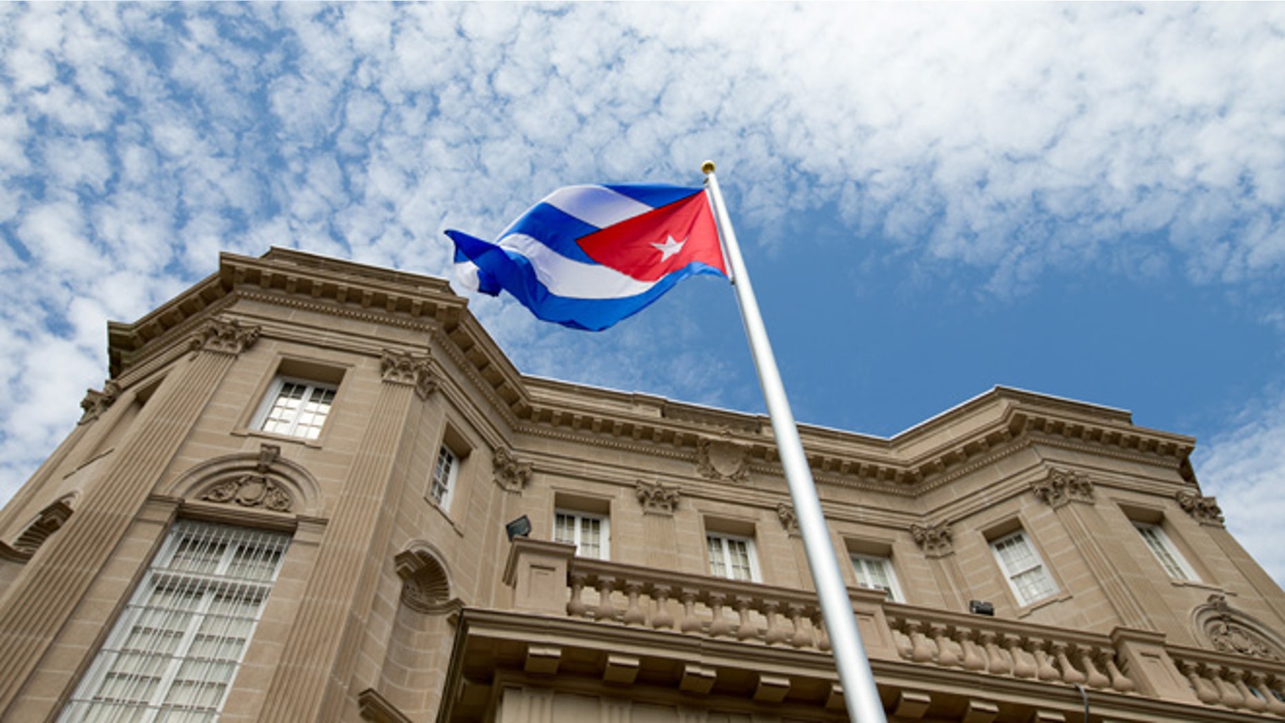 July 20, 2015: The Cuban flag is raised over their new embassy in Washington.