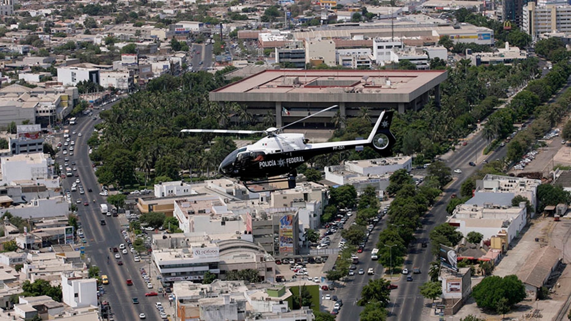A police helicopter flies over Culiacan May 28, 2008.
