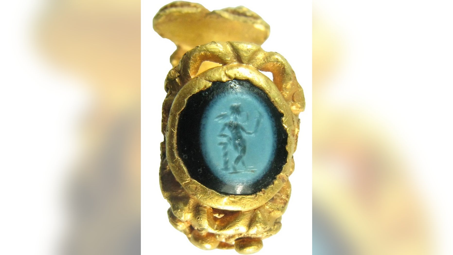 A 1,700-year-old gold ring with a stone showing Cupid carrying a torch would've been worn on the finger of a man or woman at a time when the Roman Empire controlled England.
