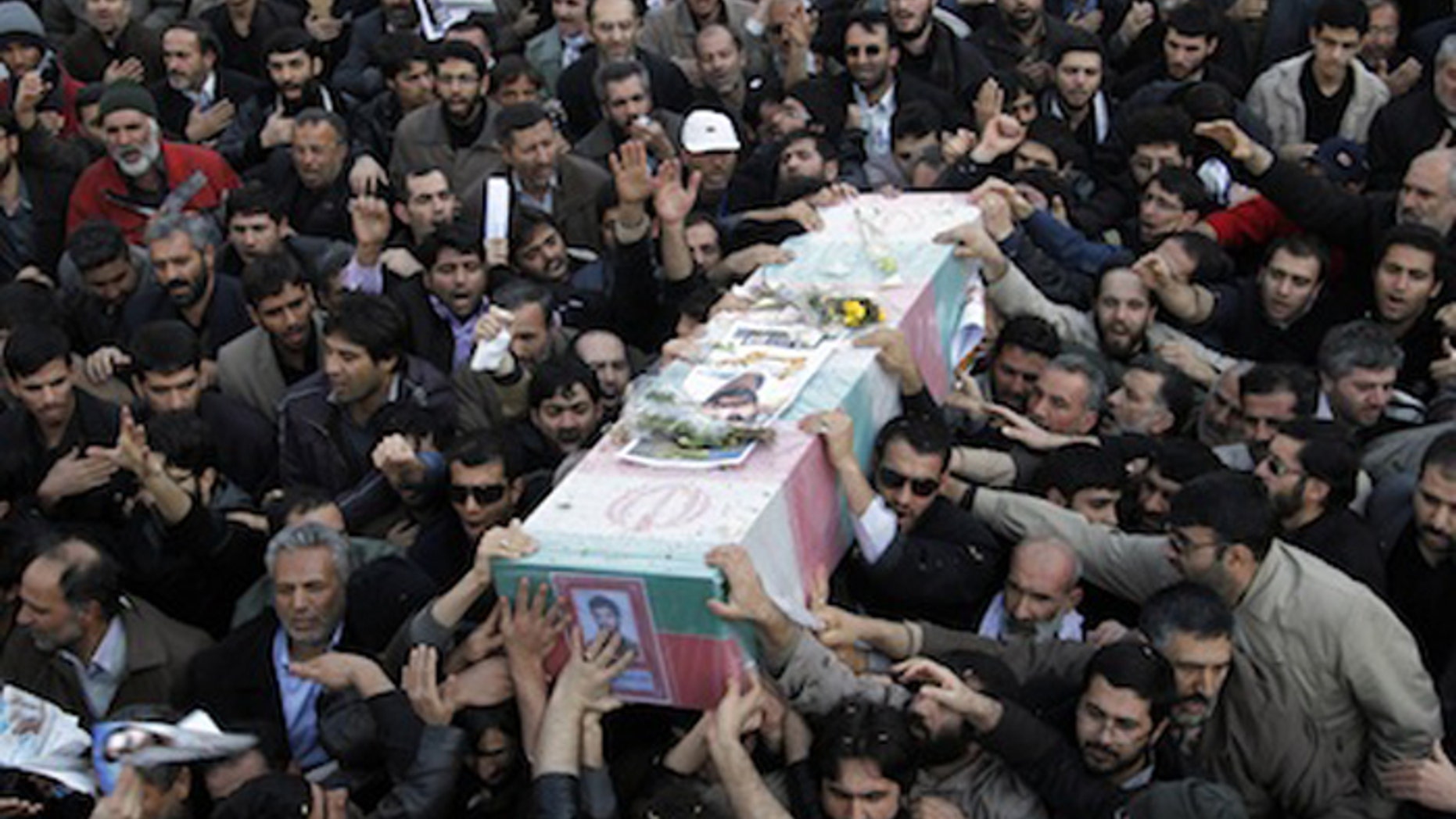 Iranians mourn nuclear scientists killed last year in an apparent assassination. But Tehran is not saying the latest death of a top scientist was the work of Israel. (AP)