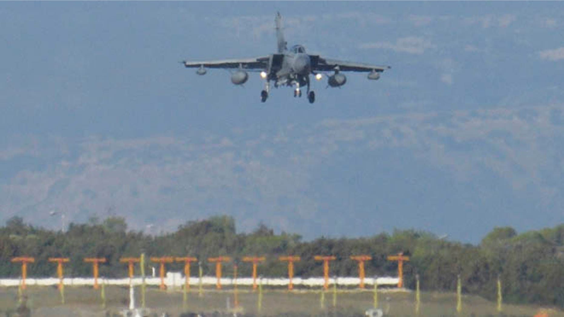 Dec. 3, 2015: A British Tornado warplane lands at the RAF Akrotiri, a British air base near coastal city of Limassol, Cyprus, after arriving from an airstrike against Islamic State group targets in Syria.