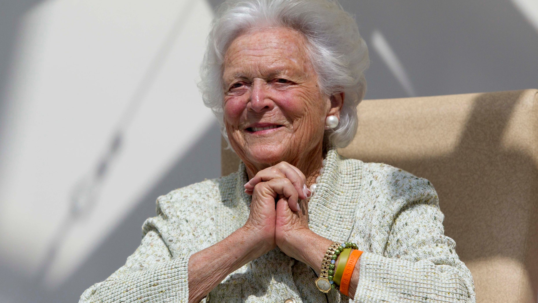 FILE - In a Thursday, Aug. 22, 2013 file photo, former first lady Barbara Bush listens to a patient's question during a visit to the Barbara Bush Children's Hospital at Maine Medical Center in Portland, Maine. Bush spokesman Jim McGrath says the wife of former President George H.W. Bush was released from Houston Methodist Hospital late Saturday morning, Jan. 5, 2014. The 88-year-old Bush family matriarch had been hospitalized since Monday. (AP Photo/Robert F. Bukaty, File)