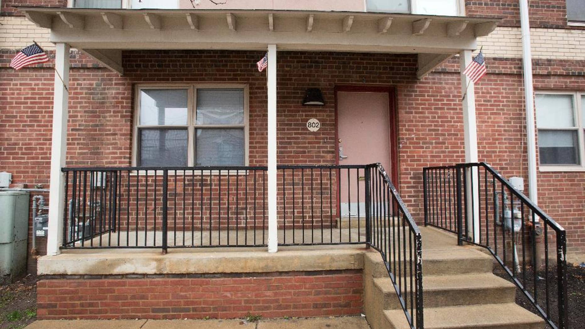 Shown is the home of a woman who is accused of trying to join and martyr herself for the Islamic State group in Syria, Friday, April 3, 2015, in Philadelphia. Thirty-year-old Keonna Thomas appeared in federal court Friday afternoon just hours after her arrest on a charge of attempting to provide material support and resources to a foreign terrorist organization. A prosecutor says a search warrant executed March 27 at Thomas' home prevented her from leaving the U.S. on a flight scheduled for March 29.(AP Photo/Matt Rourke)