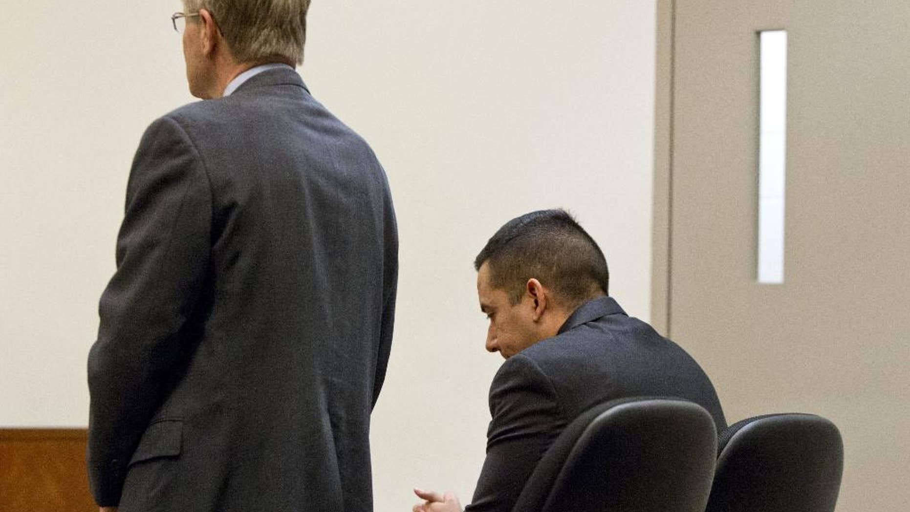 Ruben Hernandez, right, a Las Vegas-based FBI special agent, appears with his defense attorney, Larry Willey, in the Kent County Courthouse in Grand Rapids, Mich., on Friday, Feb. 24, 2017. Hernandez, who was accused of assault with intent to commit great-bodily harm and assault with a dangerous weapon, pleaded no contest. (Cory Morse /The Grand Rapids Press via AP)