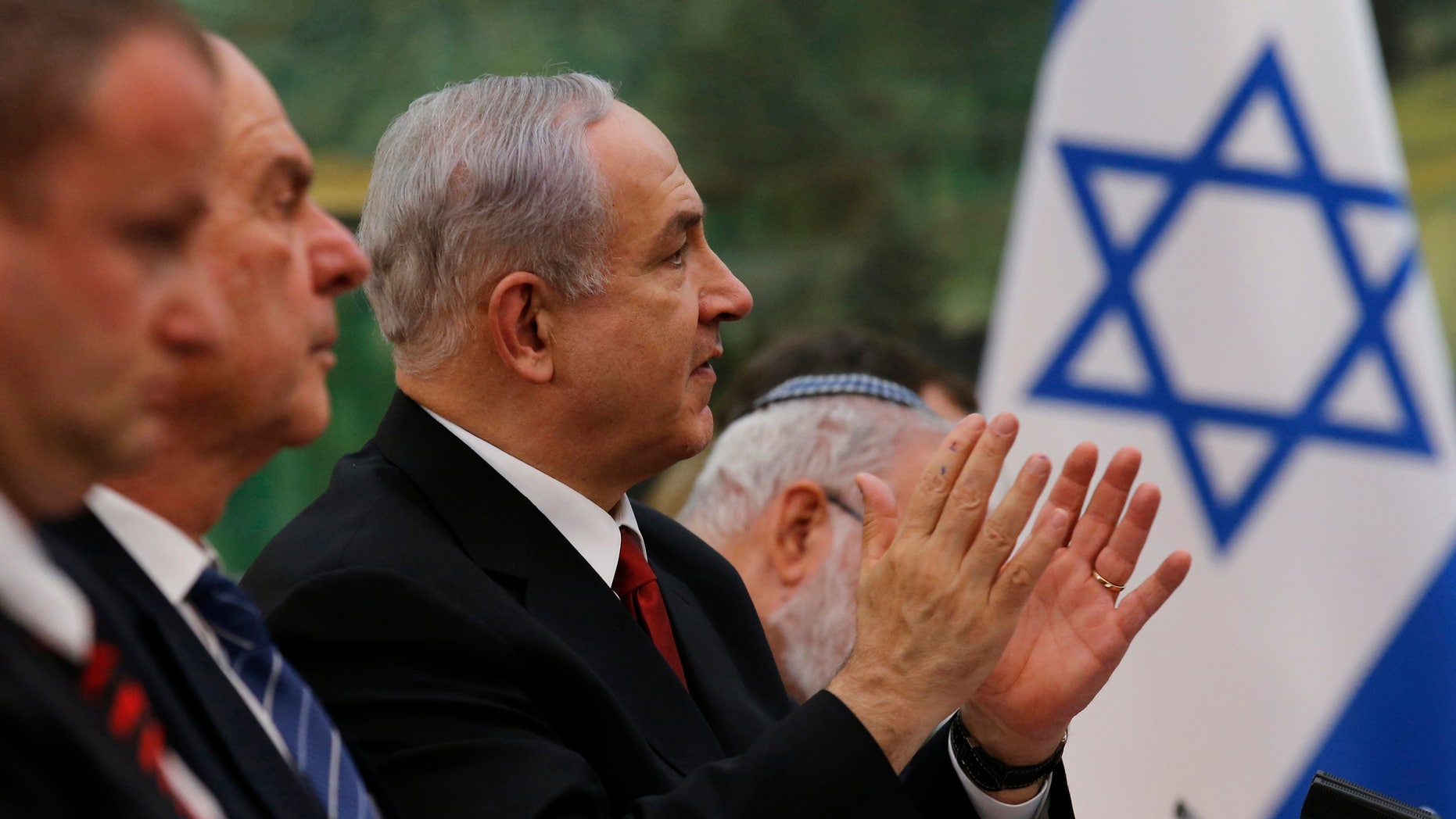Israeli Prime Minister Benjamin Netanyahu, third from left, speaks to Chinese President Xi Jinping, unseen, during a meeting at the Great Hall of the People in Beijing, Thursday, May 9, 2013. (AP Photo/Kim Kyung-Hoon, Pool)