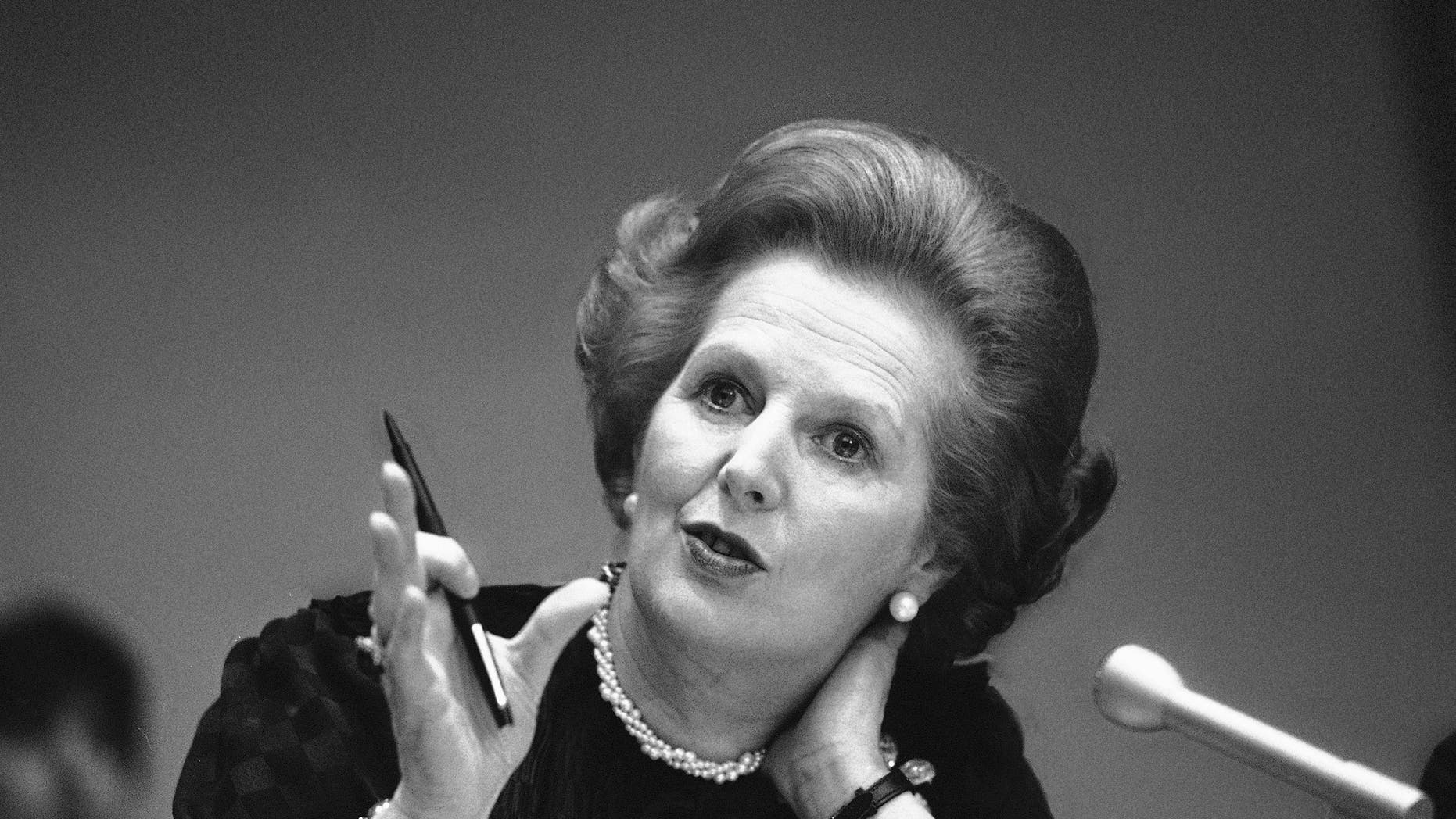 FILE - In this June 23, 1982 file photo, Britain's Prime Minister Margaret Thatcher gestures with her pen as she answers a reporters question during a news conference at the United Nations. Ex-spokesman Tim Bell says that Thatcher has died. She was 87. Bell said the woman known to friends and foes as "the Iron Lady" passed away Monday morning, April 8, 2013. (AP Photo/File)
