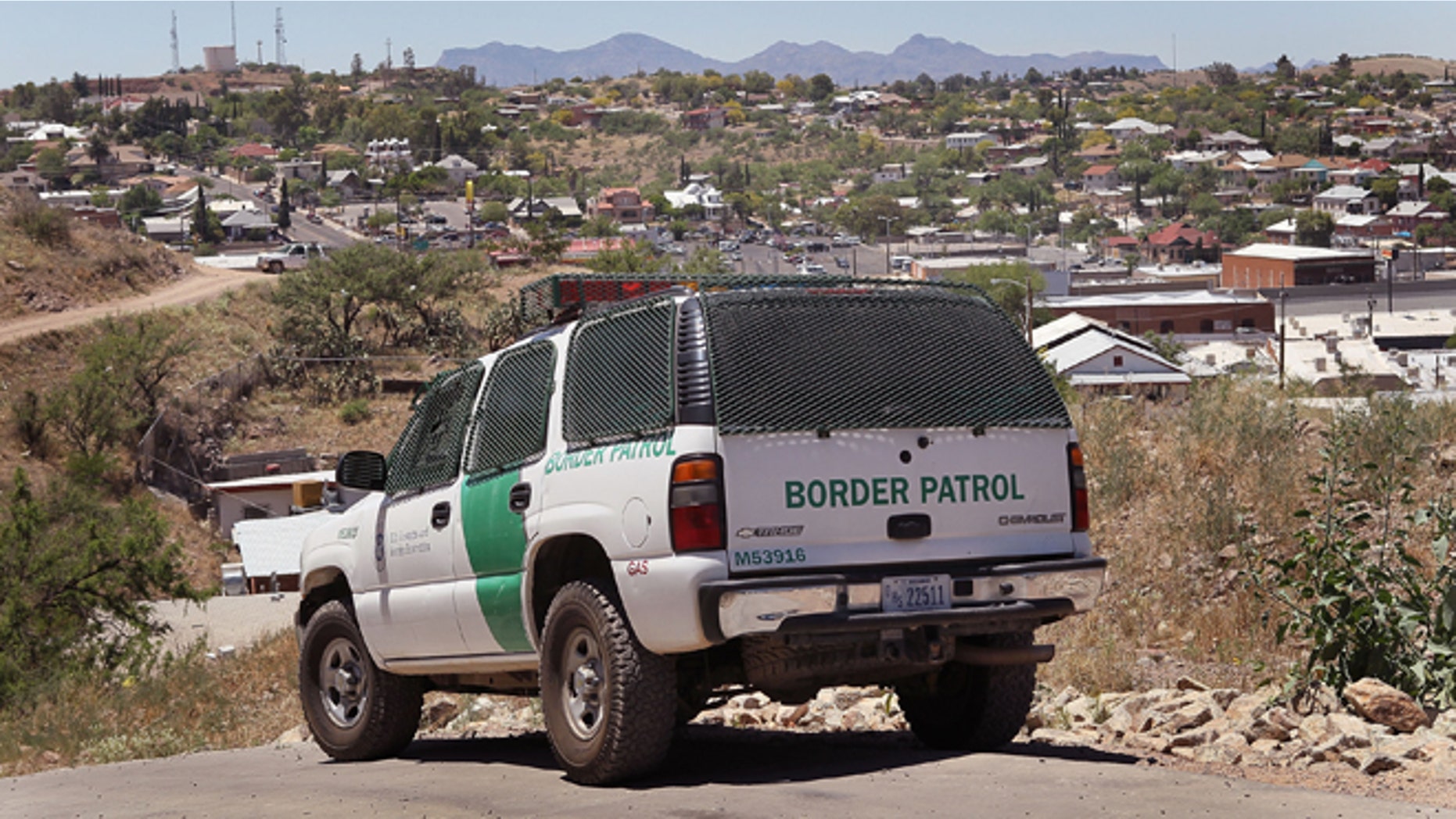 NOGALES, AZ - JUNE 01: A Border Patrol agent patrols the border June 1, 2010 in Nogales, Arizona. During the 2009 fiscal year 540,865 undocumented immigrants were apprehended entering the United States illegally along the Mexican border, 241,000 of those were captured along this 262 mile stretch of the border known as the Tucson Sector. (Photo by Scott Olson/Getty Images)