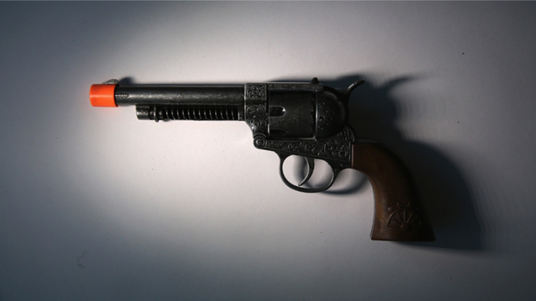NEW YORK, NY - NOVEMBER 18: A toy gun is displayed after being confiscated at an airport security checkpoint at the JFK International Airport on November 18, 2014 in New York City. The Transportation Security Administration (TSA), displayed a cash of weapons and prohibited items taken up from travelers at airport security checkpoints and from checked luggage. The federal agency is reminding people to pack carefully during the heavy holiday travel season. (Photo by John Moore/Getty Images)