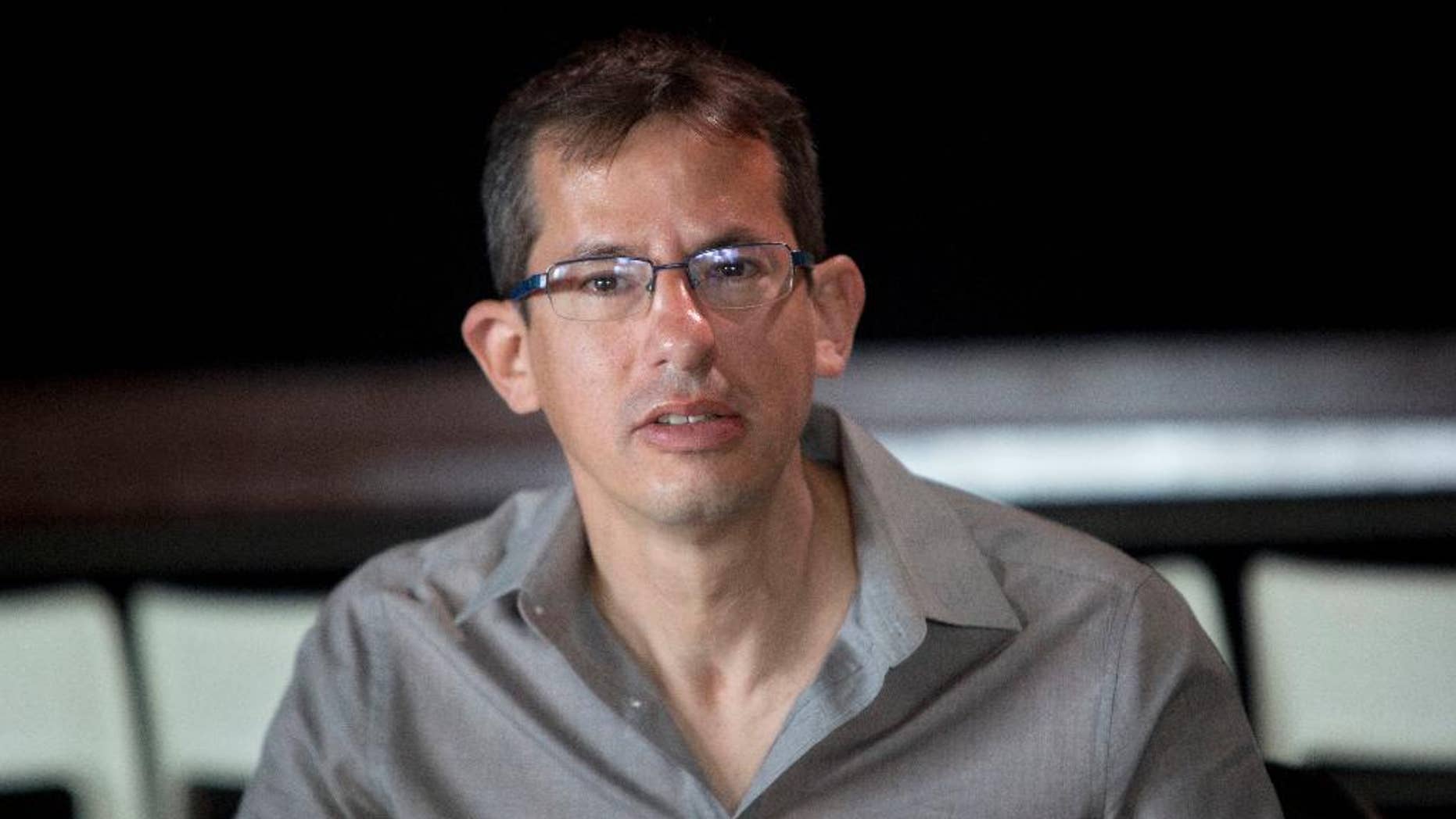 In this picture taken Friday, Feb. 5, 2016, Hagai El-Ad the executive director, for the left wing group 'B'Tselem' speaks during a press conference in Tel Aviv, Israel. The leading Israeli rights group said Wednesday it will stop seeking investigations of Israeli soldiers suspected of abusing Palestinians, arguing that internal military probes have failed to deliver justice and effectively help whitewash half a century of occupation. (AP Photo/Sebastian Scheiner)