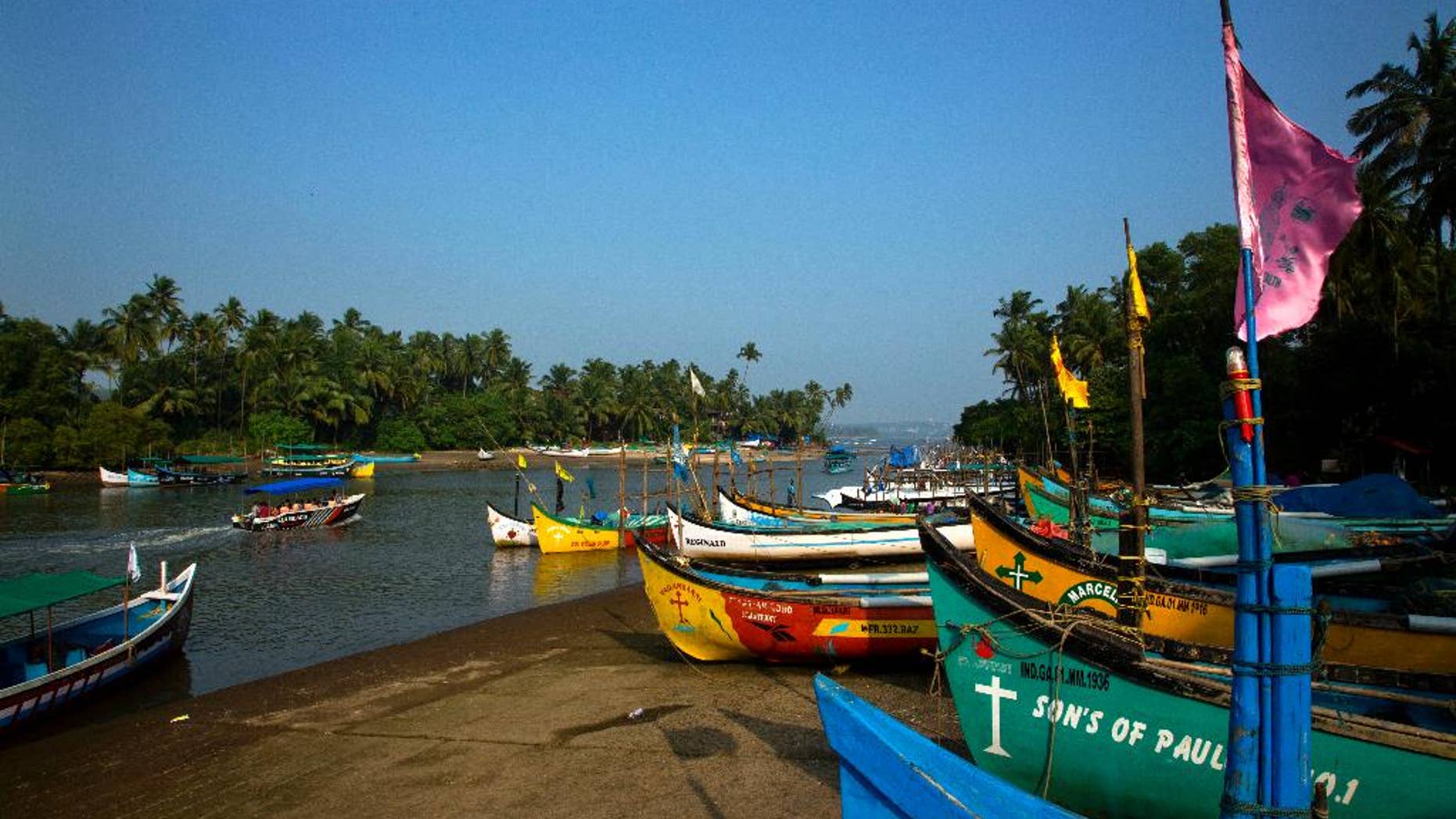 Fishing boats are seen anchored on the bank of a river, in Goa, Friday, Oct. 14, 2016. The leaders of five big developing nations that banded together in 2009 as the so-called BRICS nations, are set to attend their annual summit Oct. 15-16, 2016 in a beach resort town in the western Indian state of Goa. But with their own economies now flagging, some analysts are questioning whether the group, consisting of Brazil, Russia, India, China and South Africa, still has clout in representing nearly half the world's population and a quarter of its economy at $16.6 trillion. (AP Photo/Anupam Nath)