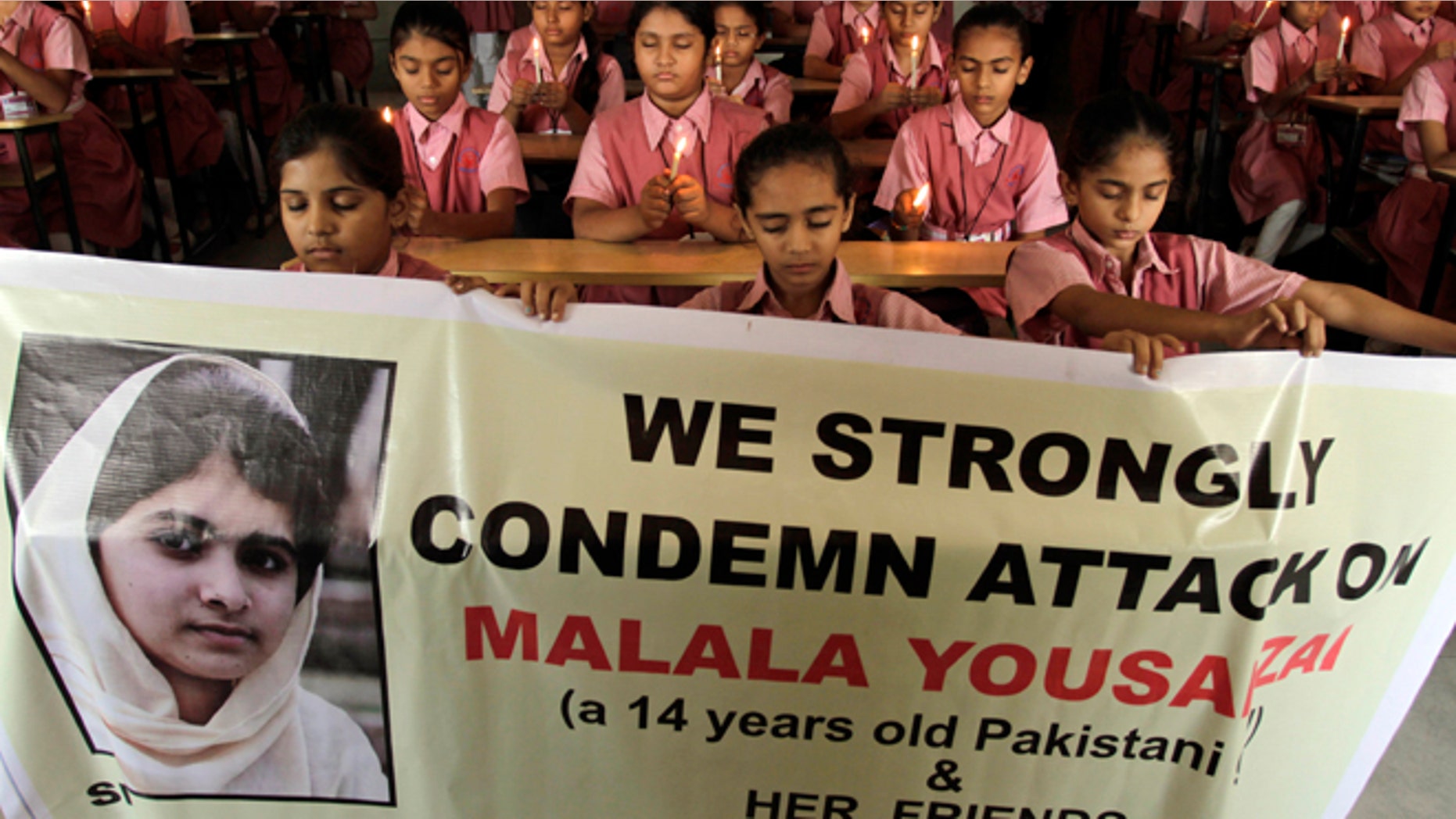 Oct. 17, 2012: Indian students participate in a prayer ceremony in support of and for the recovery of 14-year-old schoolgirl Malala Yousufzai, who was shot in the head last Tuesday by the Taliban for speaking out in support of education for women, at a school in Ahmadabad, India.