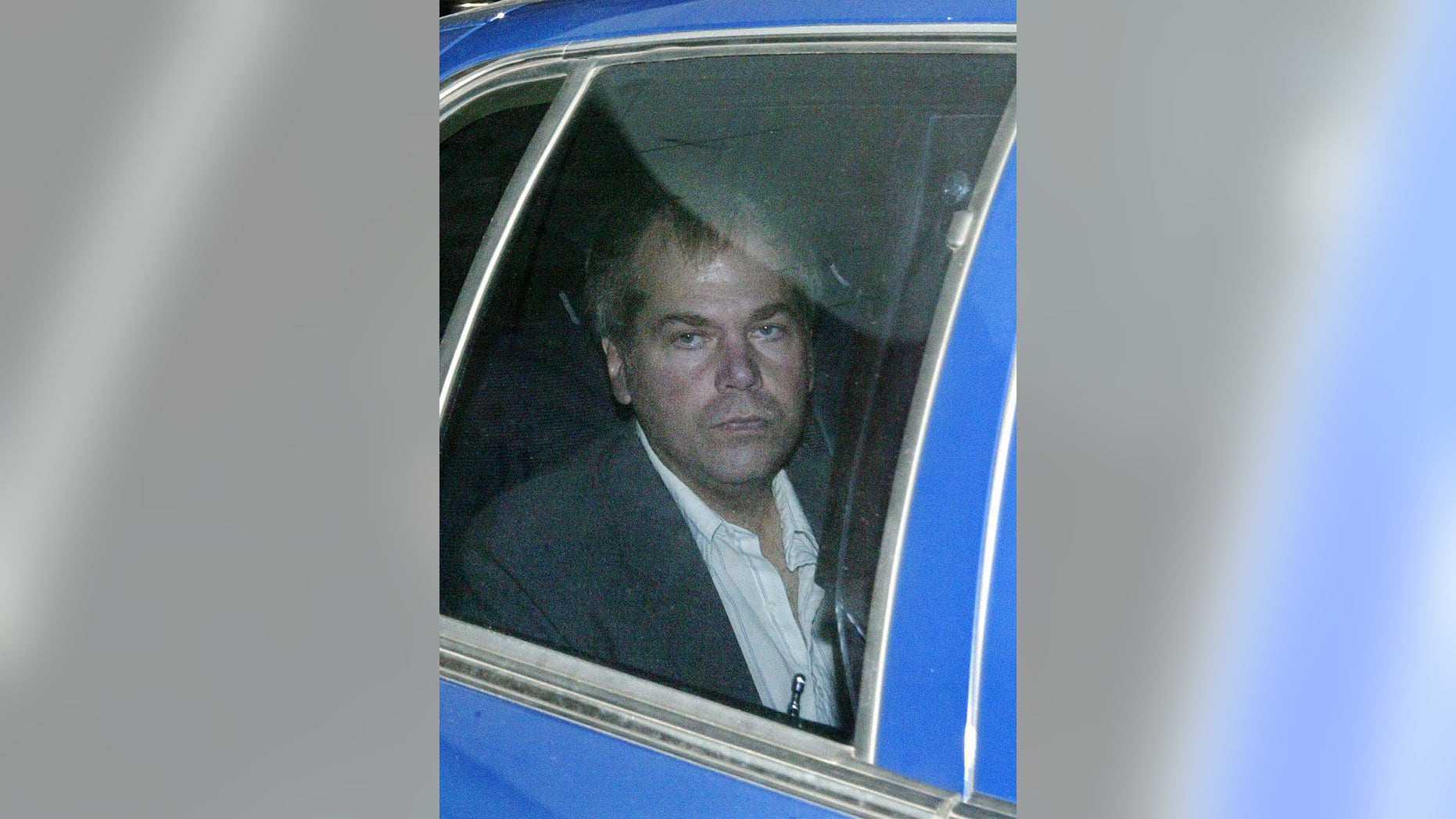 FILE - In a Nov. 18, 2003 file photo, John Hinckley Jr. arrives at U.S. District Court in Washington. Hinckley, the man who shot President Ronald Reagan is back in court for hearings on whether he should get to spend more time away from the psychiatric hospital where he has been living. (AP Photo/Evan Vucci, File)