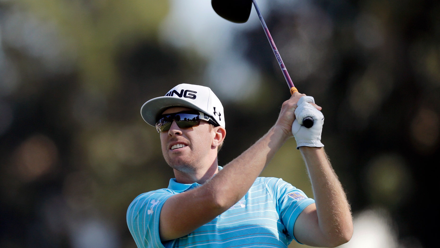 Hunter Mahan drives on the second tee in the final round of the Northern Trust Open golf tournament at Riviera Country Club in the Pacific Palisades area of Los Angeles Sunday, Feb. 17, 2013. (AP Photo/Reed Saxon)