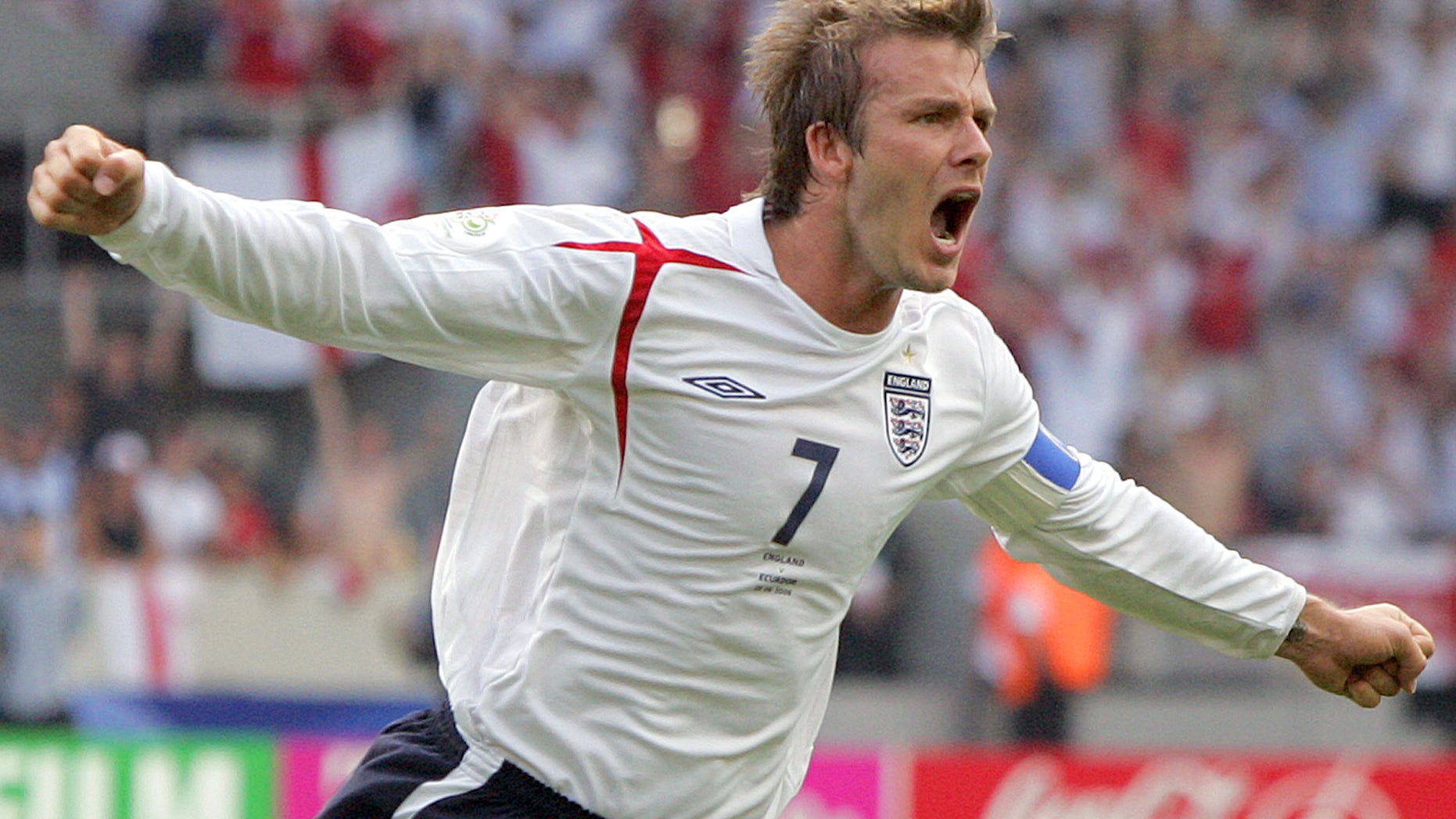 FILE - In this June 25, 2006 file photo, England's David Beckham celebrates after scoring the opening goal during the Round of 16 World Cup soccer match against Ecuador in Stuttgart, Germany. Beckham says he is retiring from soccer at the end of the season. The 38-year-old Beckham recently won a league title in a fourth country with Paris Saint-Germain. He has become a global superstar since starting his career at Manchester United. (AP Photo/Matt Dunham, FIle)