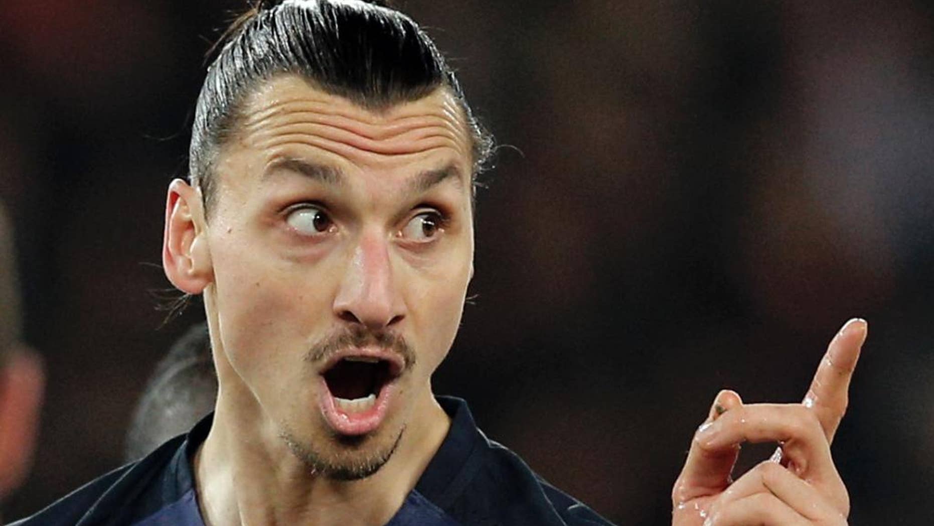 FILE - In this file photo dated Tuesday, Feb. 16, 2016, PSG's Zlatan Ibrahimovic argues during the Champions League round of 16, 1st leg soccer match between Paris Saint Germain and Chelsea at the Parc des Princes stadium in Paris, France. The 34-year-old Sweden forward, Ibrahimovic has signed for English club Manchester United, it is announced Friday July 1, 2016, handing one of soccer’s most enigmatic players a late career move to the world’s richest league. (AP Photo/Christophe Ena, FILE)