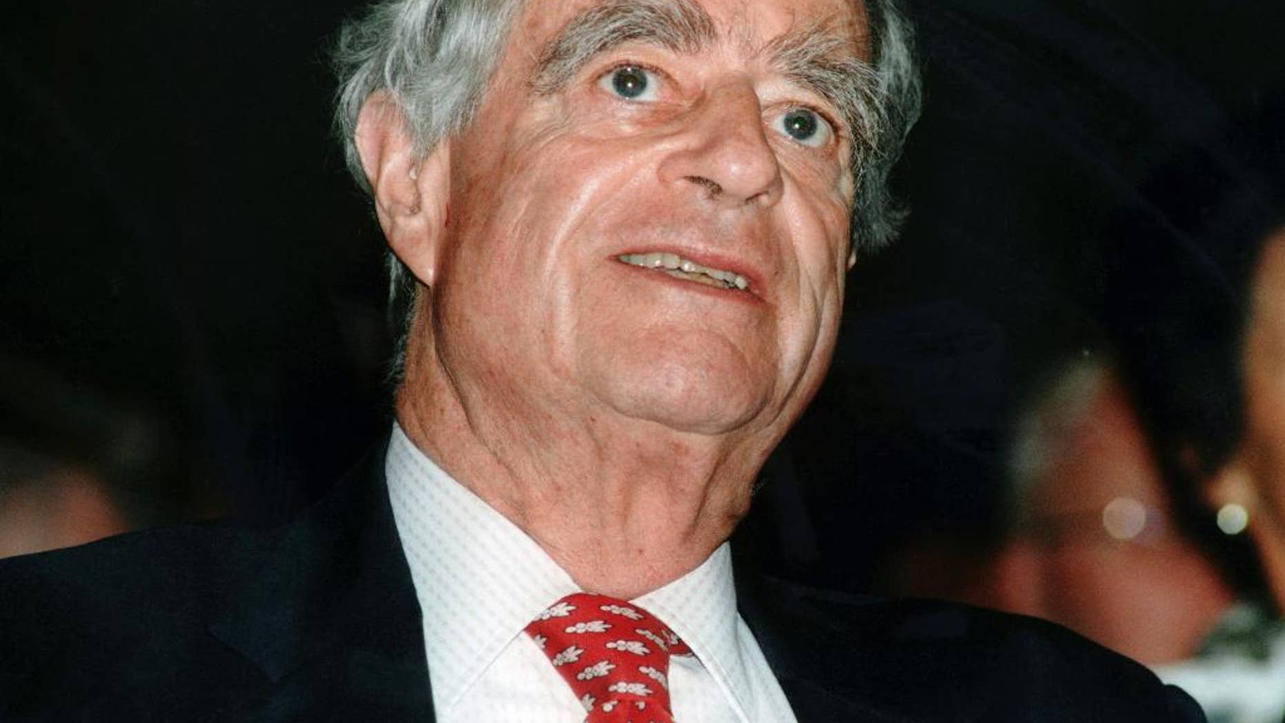 FILE - This 1996 file photo shows Dr. Luc Hoffmann. Hoffmann, a Swiss-born ornithologist and environmentalist with a passion for wetland birds who helped create the World Wildlife Fund for Nature and many other conservation groups, has died Thursday, July 21, 20165, several groups said. He was 93. (Keystone via AP, file)