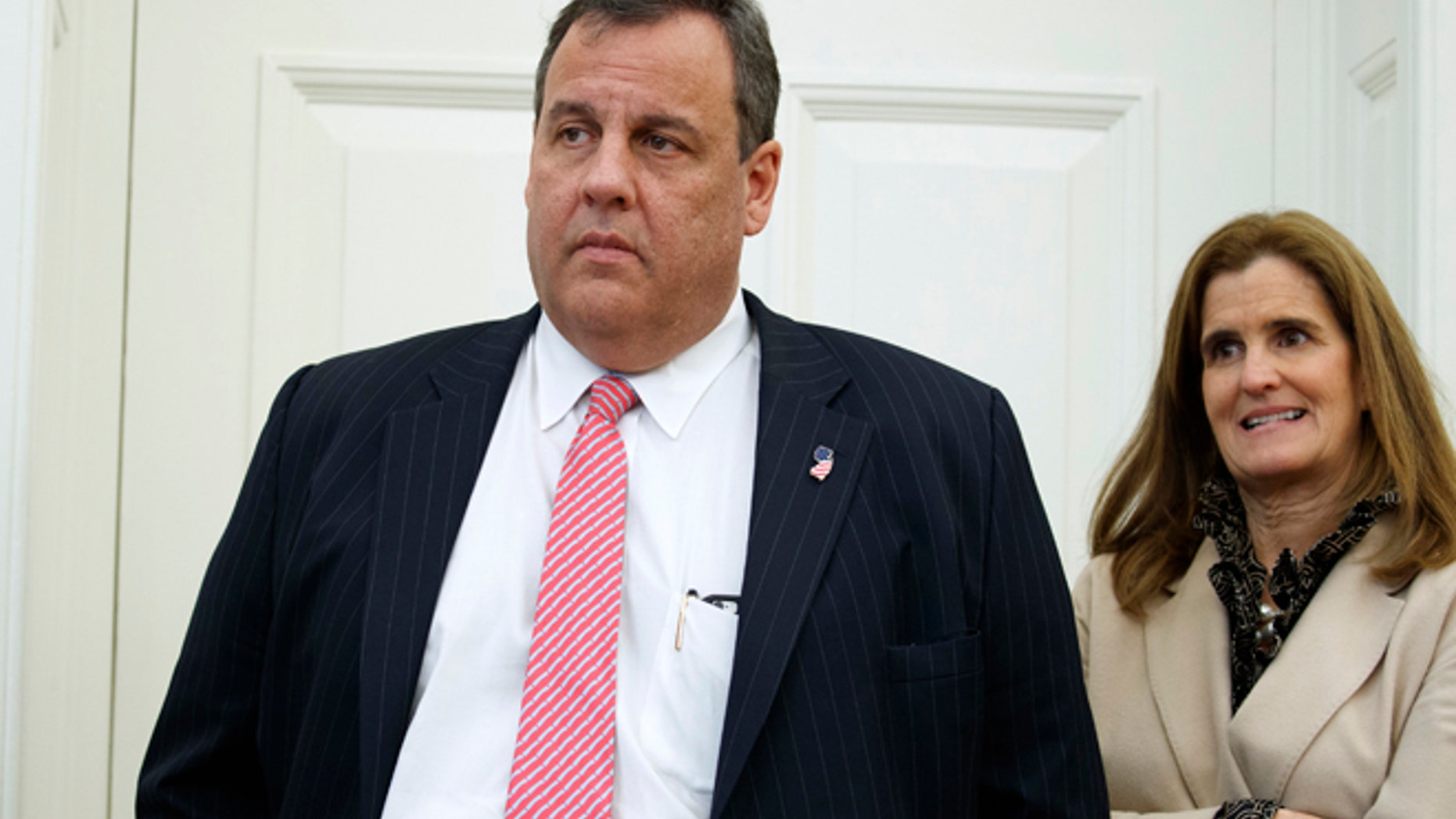 Feb. 14, 2017: New Jersey Gov. Chris Christie and his wife Mary Pat Christie watch as President Donald Trump signs House Joint Resolution 41 in the Oval Office of the White House in Washington.