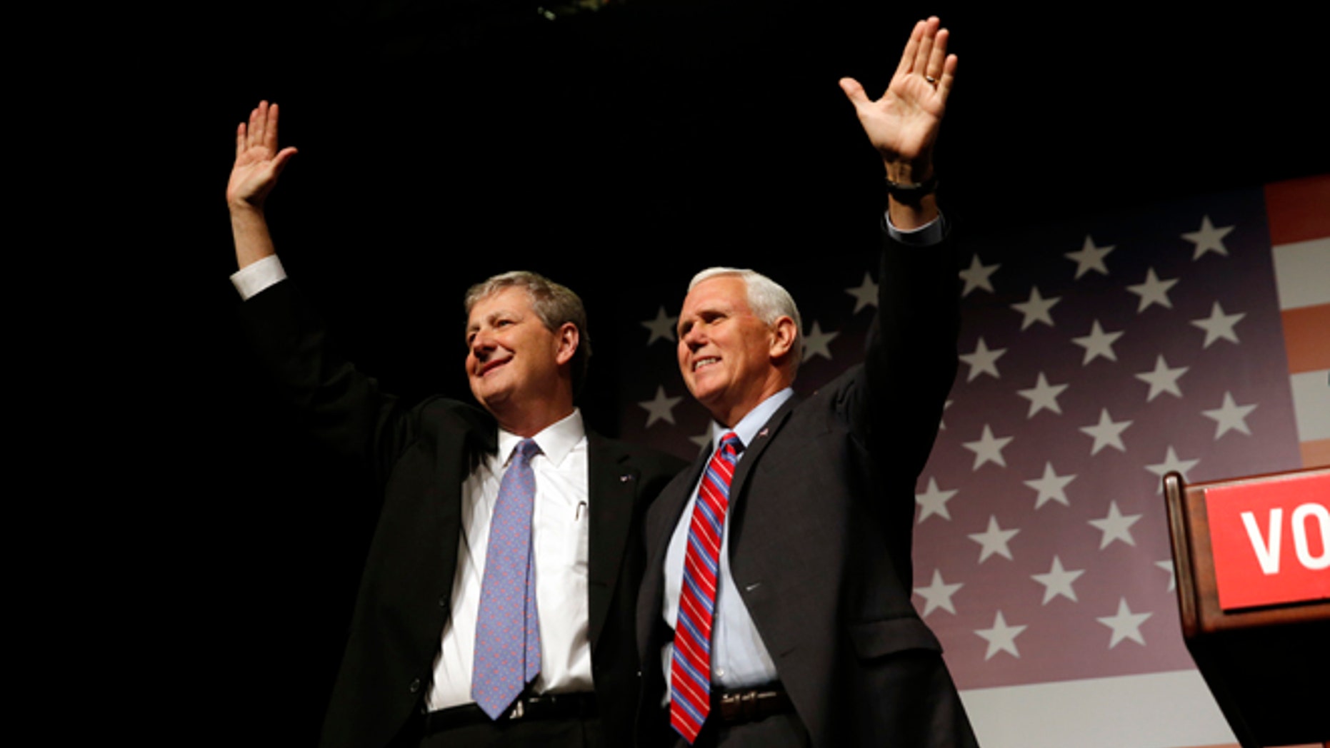 Dec. 3, 2016: Vice President-elect Mike Pence arrives at a "Get Out The Vote" rally to stump for Republican Senate candidate, Louisiana Treasurer John Kennedy, left, in New Orleans.