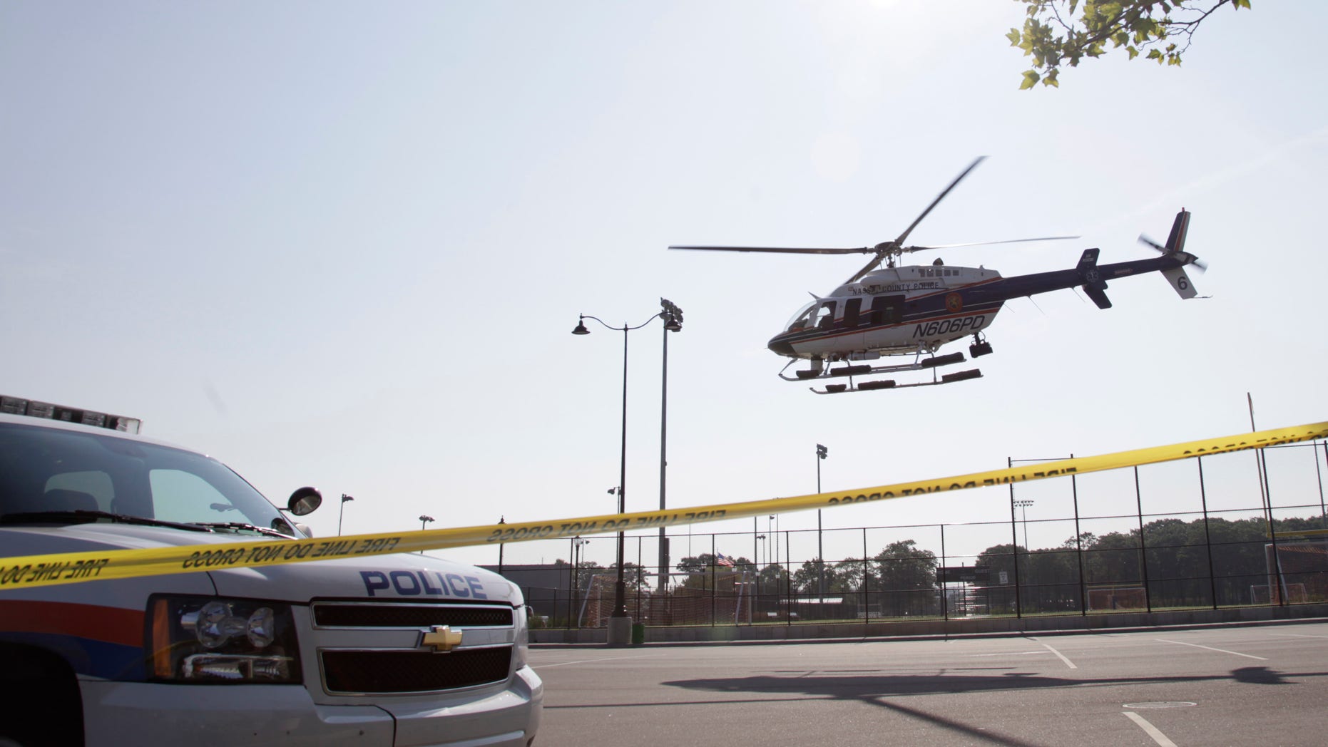 July 5: A police helicopter takes off from the scene of a news conference as part of an investigation into a fatal boating accident in Oyster Bay, N.Y.