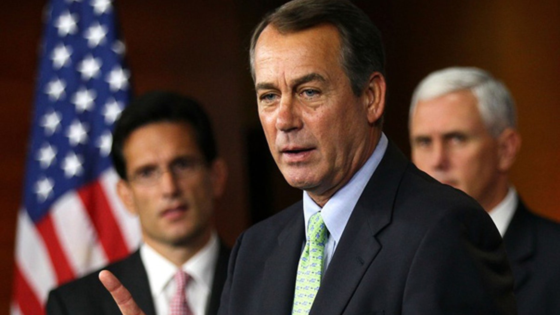 Sept. 29: Minority Leader Rep. John Boehner speaks as House Minority Whip Rep. Eric Cantor and Rep. Mike Pence listen on Capitol Hill.