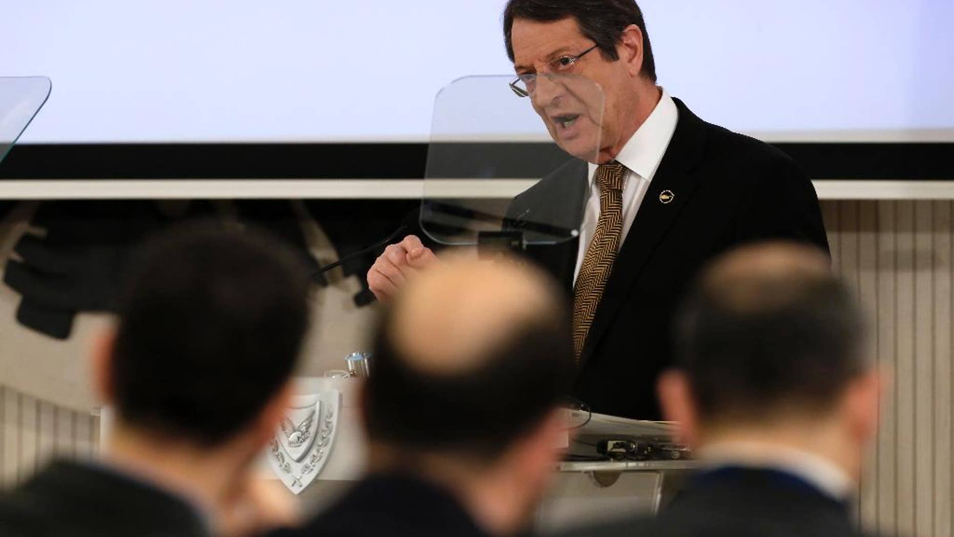 Cyprus' president Nicos Anastasiades addresses the media at the presidential palace in capital Nicosia in this Mediterranean island of Cyprus, Thursday, April 7, 2016. Anastasiades takes stock of his presidency on domestic matters three years into his tenure. (AP Photo/Petros Karadjias)