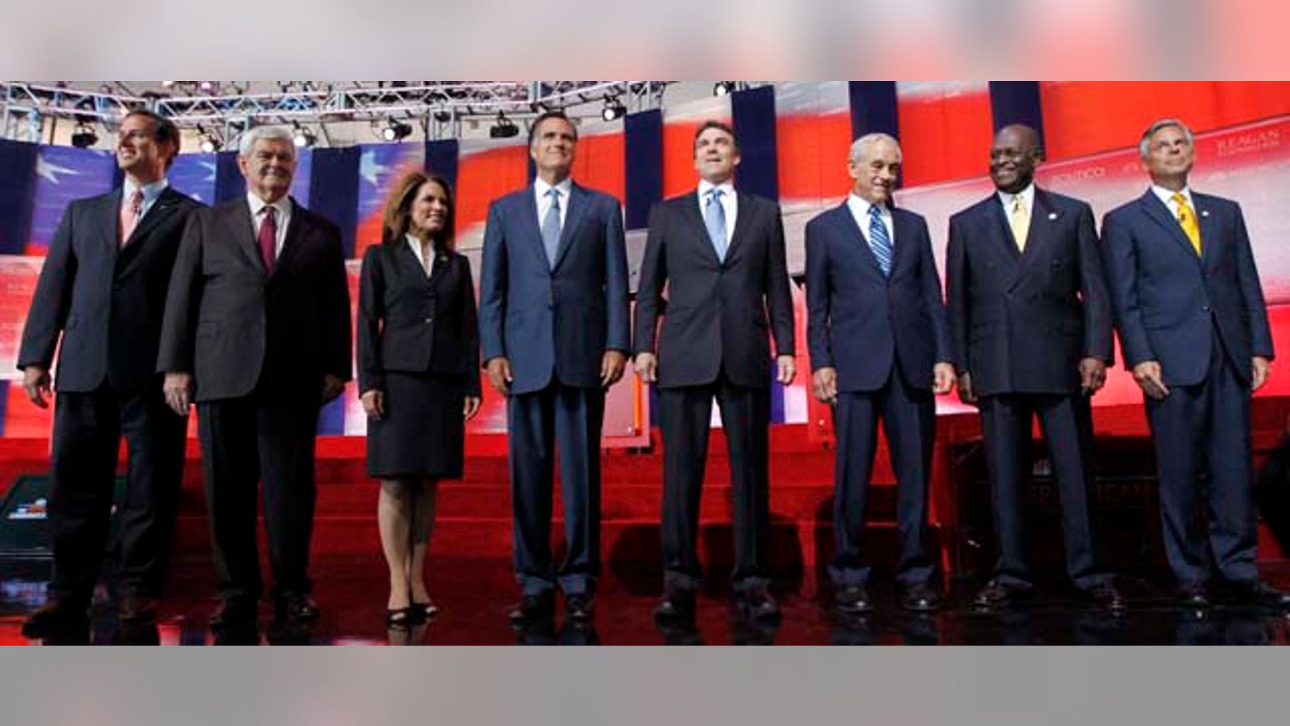 FILE - In this Sept. 7, 2011, file photo Republican presidential candidates stand together before a Republican presidential candidate debate at the Reagan Library in Simi Valley, Calif. They will debate again on Sept. 22, 2011, in Orlando. (AP Photo/Chris Carlson, File)
