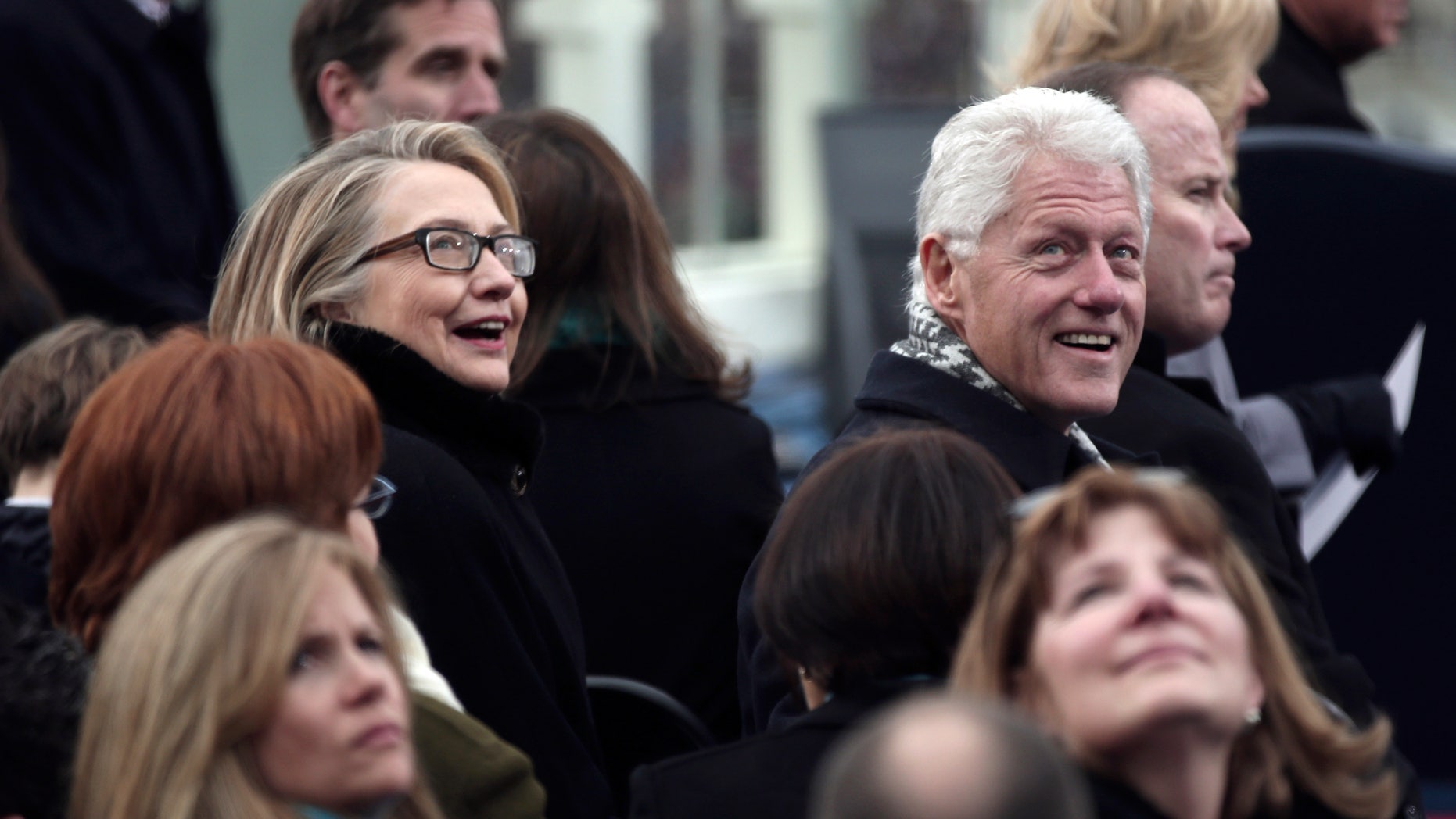Secretary of State Hillary Rodham Clinton and former president Bill Clinton look on during the ceremonial swearing-in ceremony during the 57th President Inauguration, Monday, Jan. 21, 2013, on the West Front of the Capitol in Washington. (AP Photo/Win McNamee, Pool)