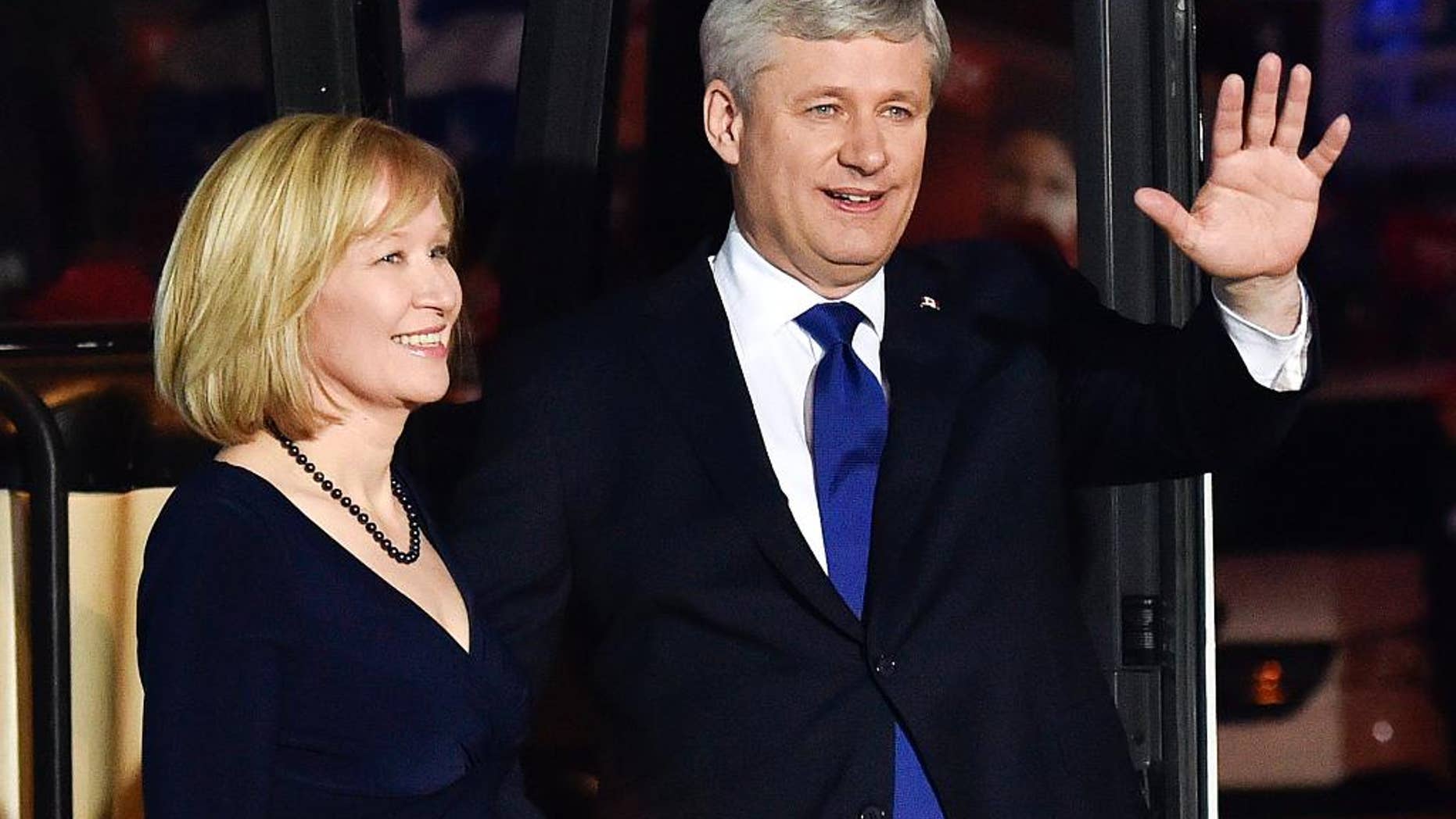 Conservative leader Stephen Harper, right, and his wife Laureen Harper arrive for the final leaders debate in Montreal on Friday, Oct. 2, 2015. (Nathan Denette/The Canadian Press via AP) MANDATORY CREDIT