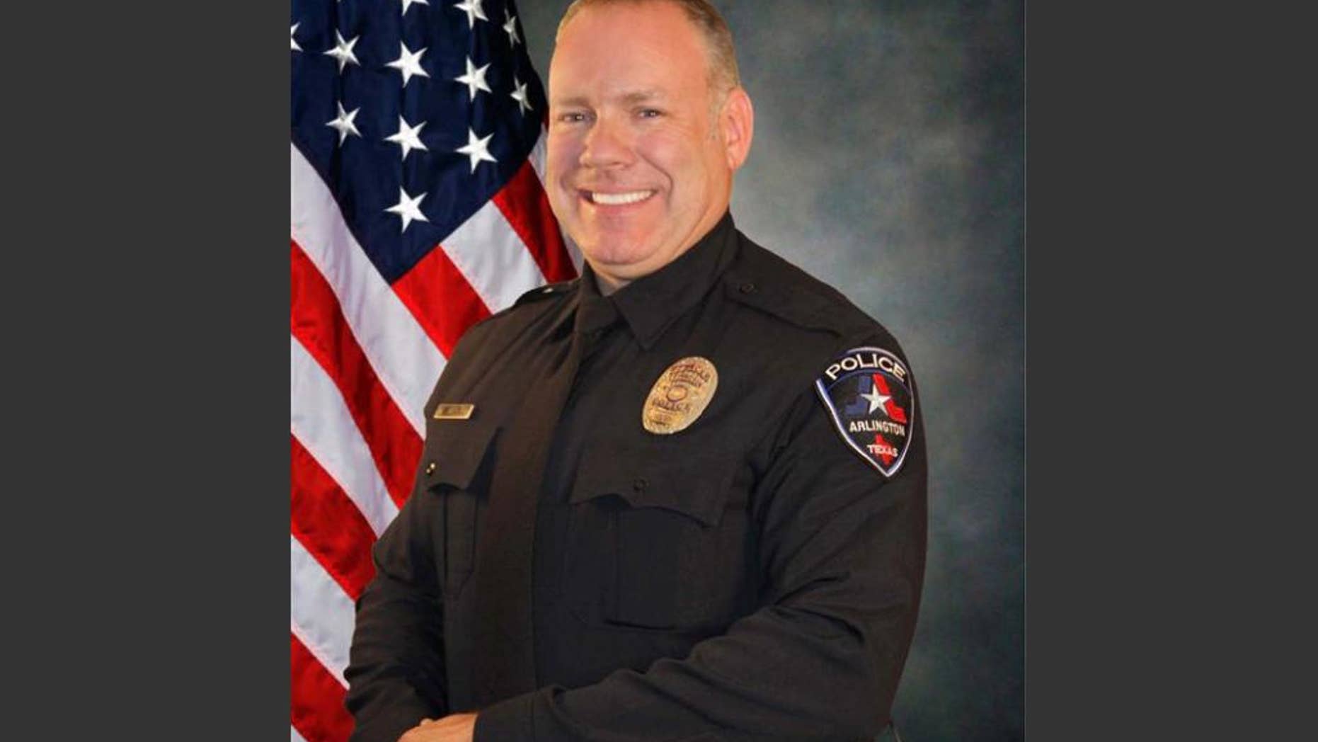 FILE- This undated file photo provided by the Arlington Police Department shows police officer Brad Miller, who killed an unarmed college football player during a suspected burglary at a Texas car dealership. Miller was fired Tuesday, Aug. 11, 2015, for making mistakes that the city's police chief said caused a deadly confrontation that put him and other officers in danger. (Arlington Police Department via AP, File)