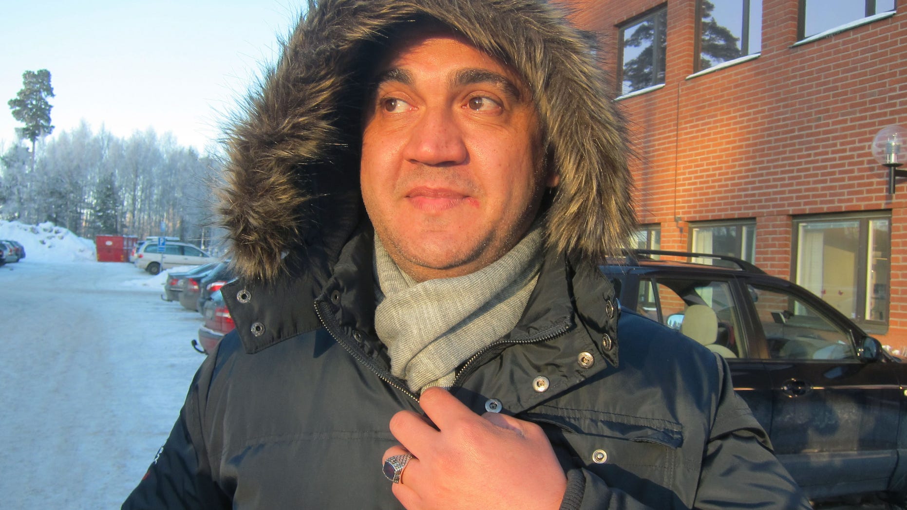 In this photo taken Jan. 23, 2013, Syrian asylum-seeker Wissam Attiki waits for a bus outside an immigration office in Marsta, Sweden. Along with Germany, which is nine times larger, Sweden stands out in Europe for its generous welcome to refugees fleeing a conflict that has killed tens of thousands and uprooted many more. European Union statistics show those two countries have received about two-thirds of the Syrians seeking shelter in the 27-nation bloc. (AP Photo/Karl Ritter)