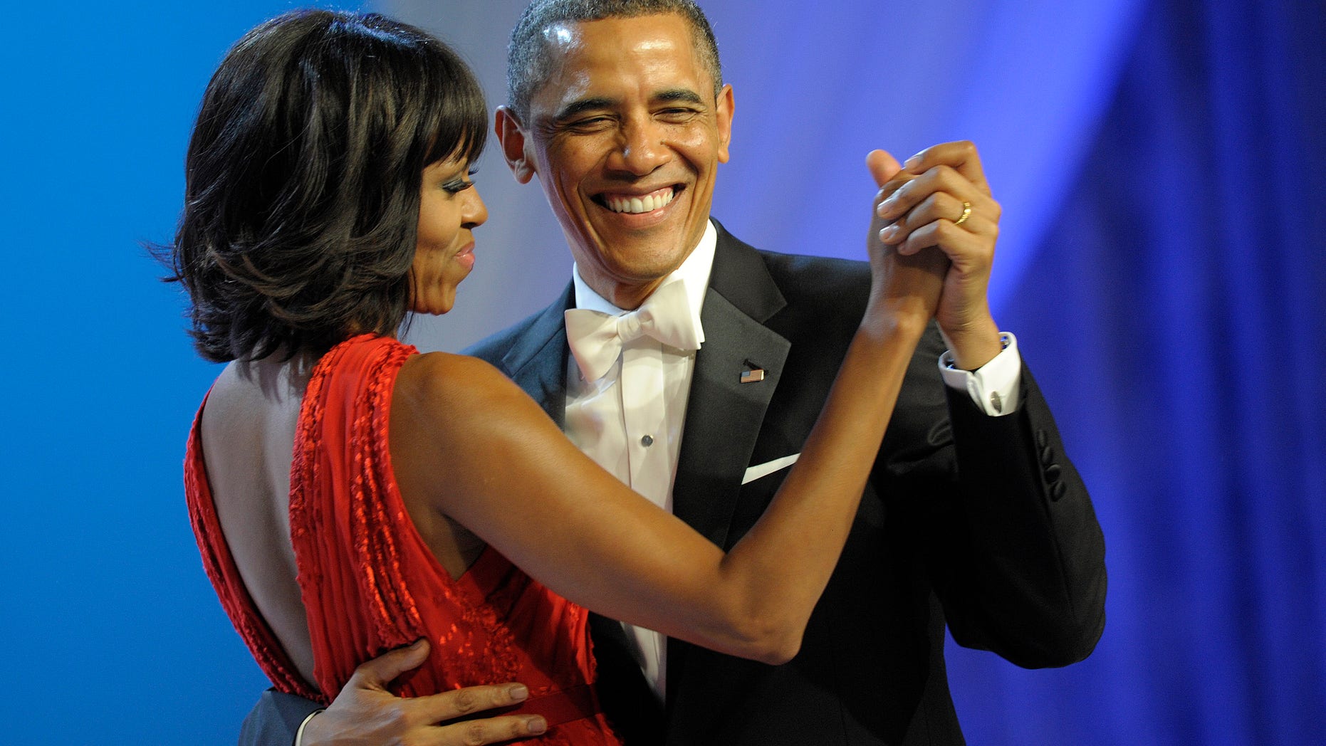 President Barack Obama dances with first lady Michelle Obama during The Inaugural Ball at the Washignton convention center during the 57th Presidential Inauguration in Washington, Monday, Jan. 21, 2013. (AP Photo/Cliff Owen)