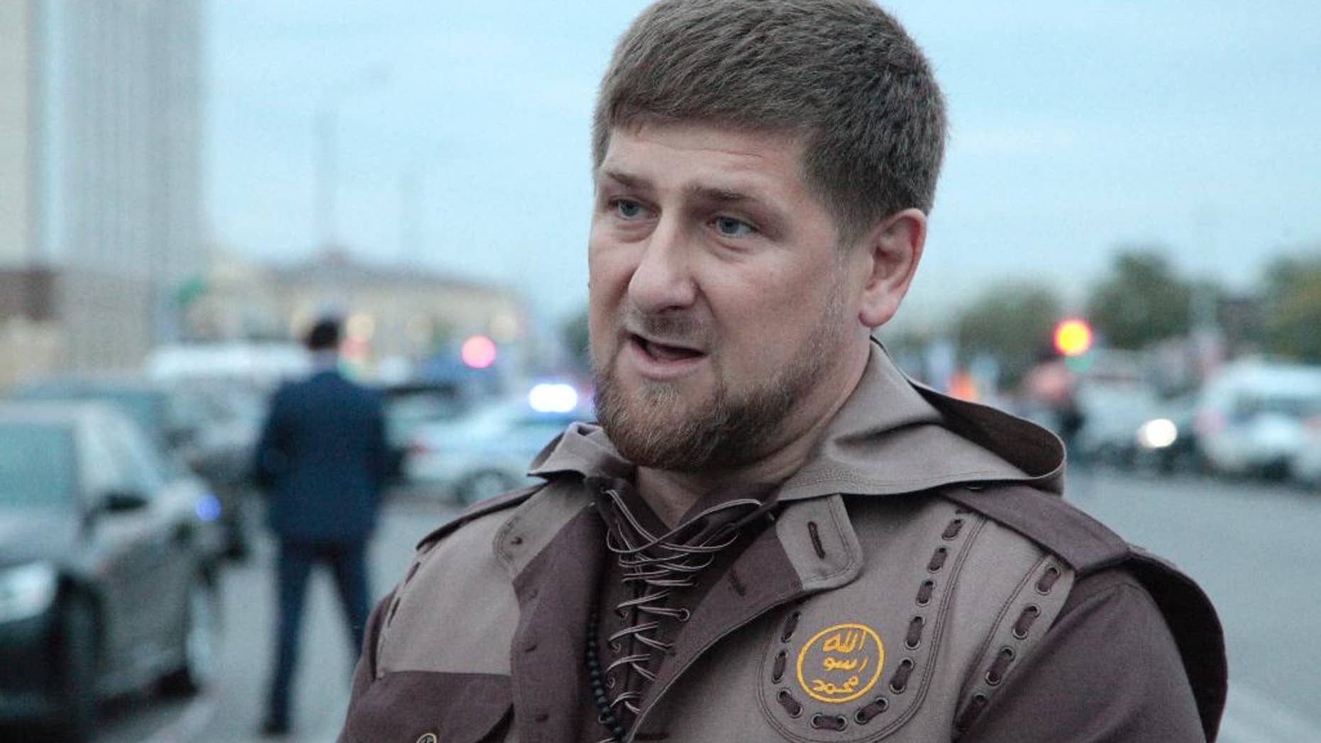 FILE - In this Oct. 5, 2014 file photo Chechen regional leader Ramzan Kadyrov talks with the press in the Chechen regional capital, Grozny, Russia. Ramzan Kadyrov’s comments on Wednesday, April 22, 2015 send a worrying sign about a potential rift between him and the Kremlin. The head of Chechnya has allowed local security forces to open fire on federal troops if they operate in the region without his approval. (AP Photo/Musa Sadulayev, File)