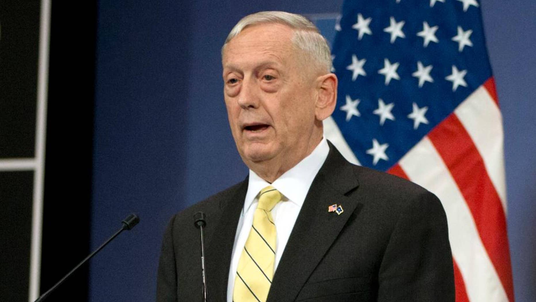 FILE - In this Feb. 16, 2017 file photo, Defense Secretary Jim Mattis speaks in Brussels. Mattis is not lonely in the Pentagon, but two months into his tenure as secretary of defense not a single political appointee has joined him. The retired Marine general, who took office just hours after President Donald Trump was sworn in, has battled the White House over choices for high-priority civilian positions that, while rarely visible to the public, are key to developing and implementing defense policy at home and abroad. (AP Photo/Virginia Mayo, File)
