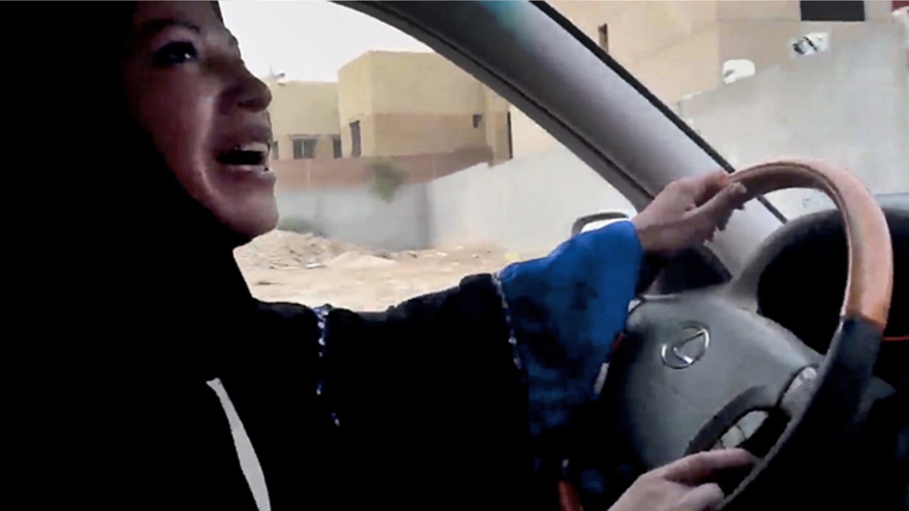 In this image made from video released by Change.org, a Saudi Arabian woman drives a car as part of a campaign to defy Saudi Arabia's ban on women driving, in Riyadh, Saudi Arabia Friday, June 17, 2011. Several Saudi women boldly got behind the wheel Friday, including one who managed a 45-minute trip through the nation's capital, seeking to ignite a road rebellion against the male-only driving rules in the ultraconservative kingdom. (AP Photo/Change.org)