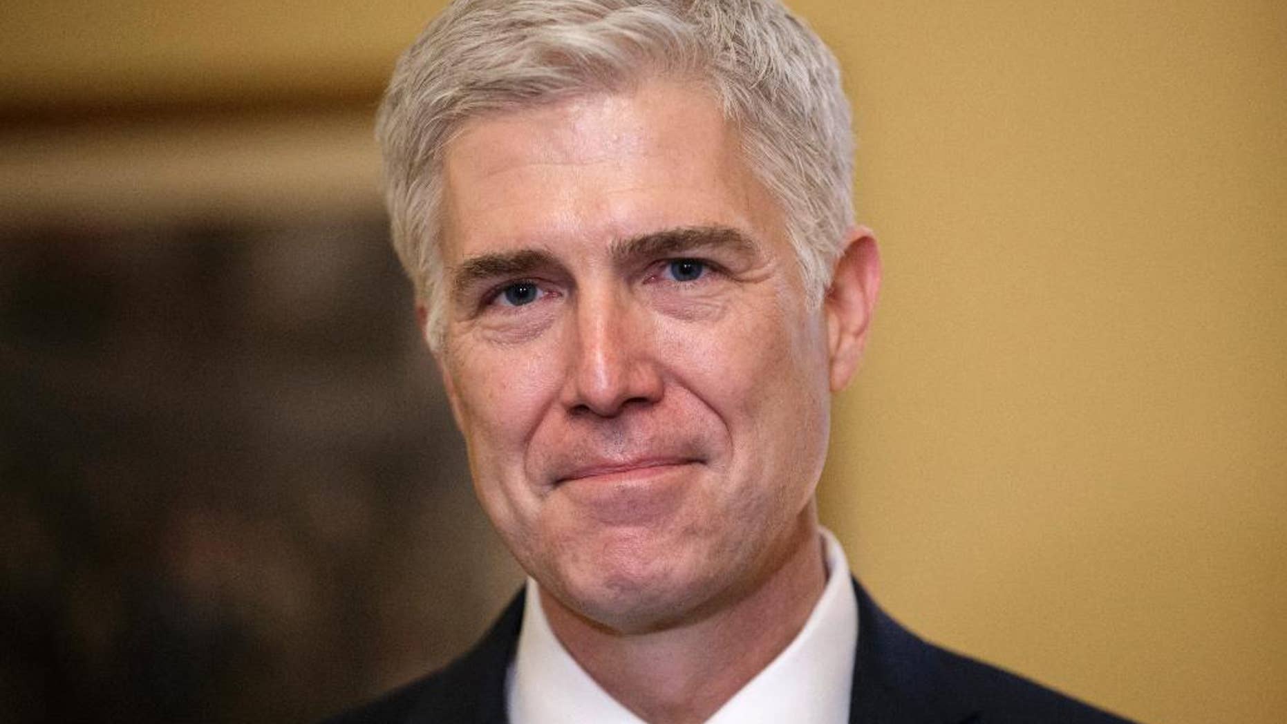 FILE - In this Feb. 1, 2017 file photo, Supreme Court Justice nominee, Neil Gorsuch is seen on Capitol Hill in Washington. Gorsuch has been a defender of free speech and a skeptic of libel claims, an Associated Press review of his rulings shows. (AP Photo/J. Scott Applewhite, File)