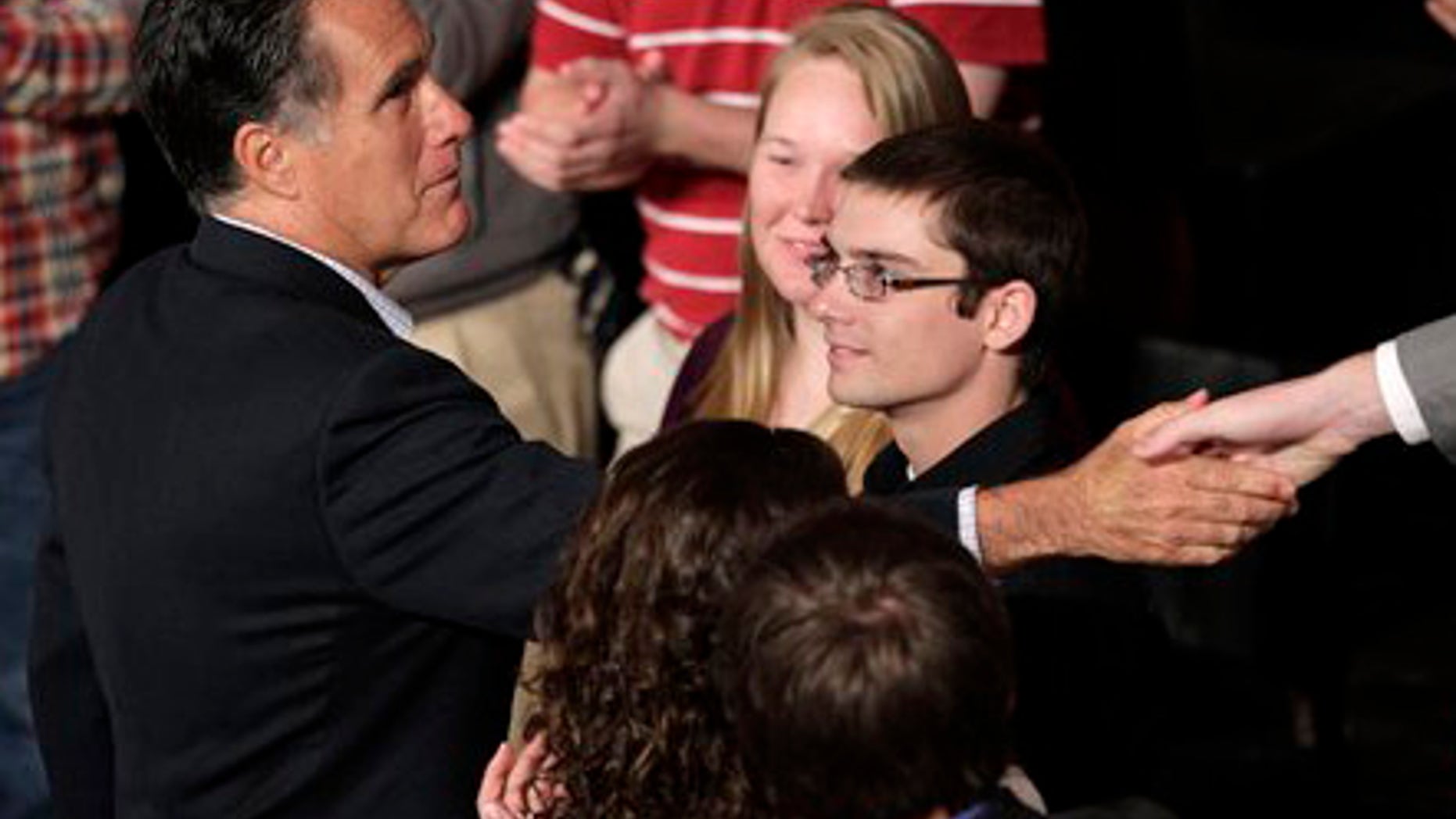Friday, April 27, 2012: Mitt Romney shakes hands with students at Otterbein University in Westerville, Ohio.