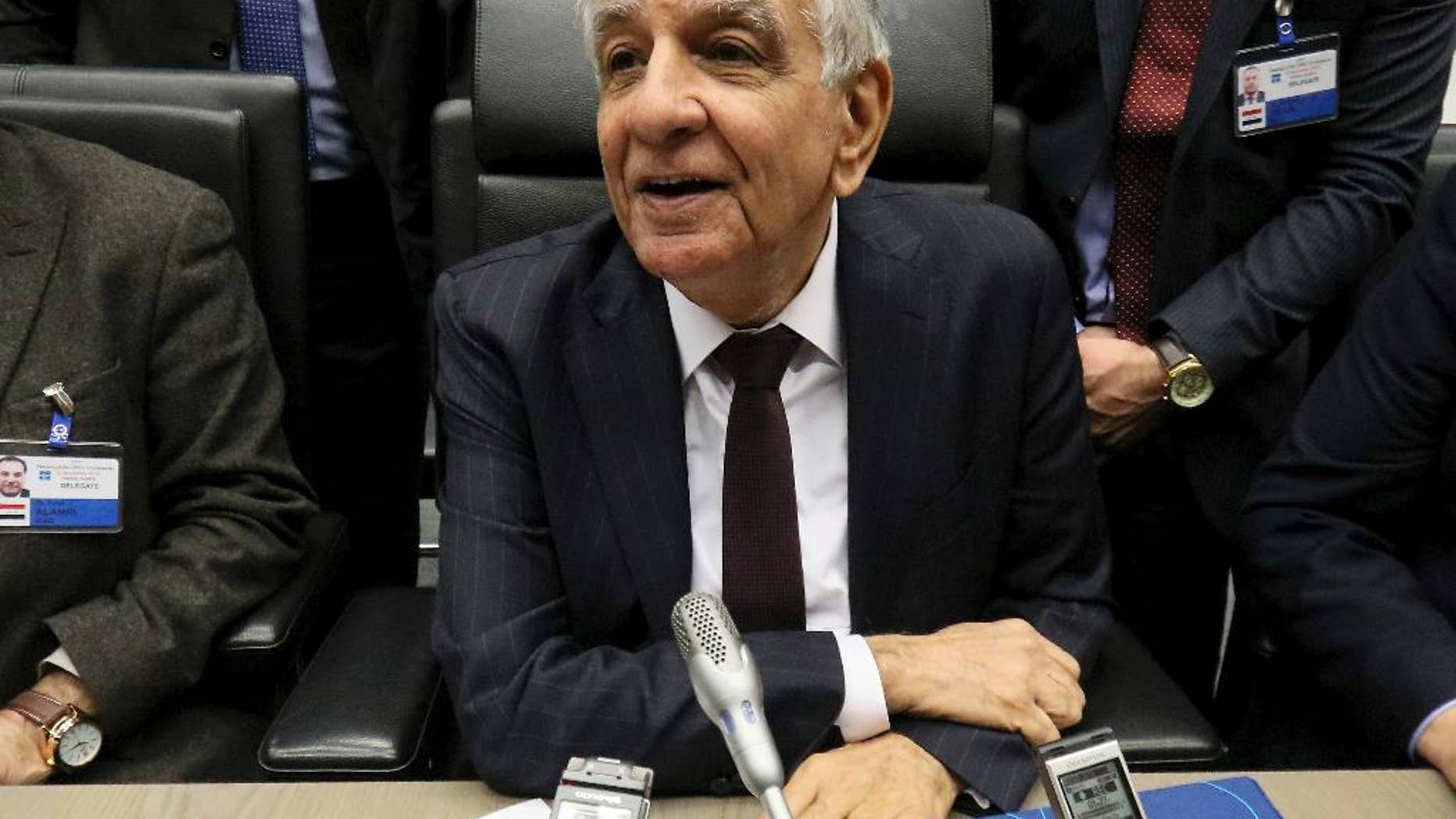 FILE -- In this Nov. 30, 2016 file photo, Iraq's Minister of Oil Jabar Ali al-Luaibi speaks to journalists prior to the start of a meeting of the Organization of the Petroleum Exporting Countries, OPEC, at their headquarters in Vienna, Austria. Iraq and Algeria said Thursday, May 11, 2017, that they support the extension of oil production cuts by OPEC and non-OPEC producers through the end of the year to try to boost prices. In a joint press conference Thursday in Baghdad by the oil ministers of the two countries, al-Luaibi said "there might be new ideas to be presented" at an OPEC meeting on May 25, without providing further details. (AP Photo/Ronald Zak, File)