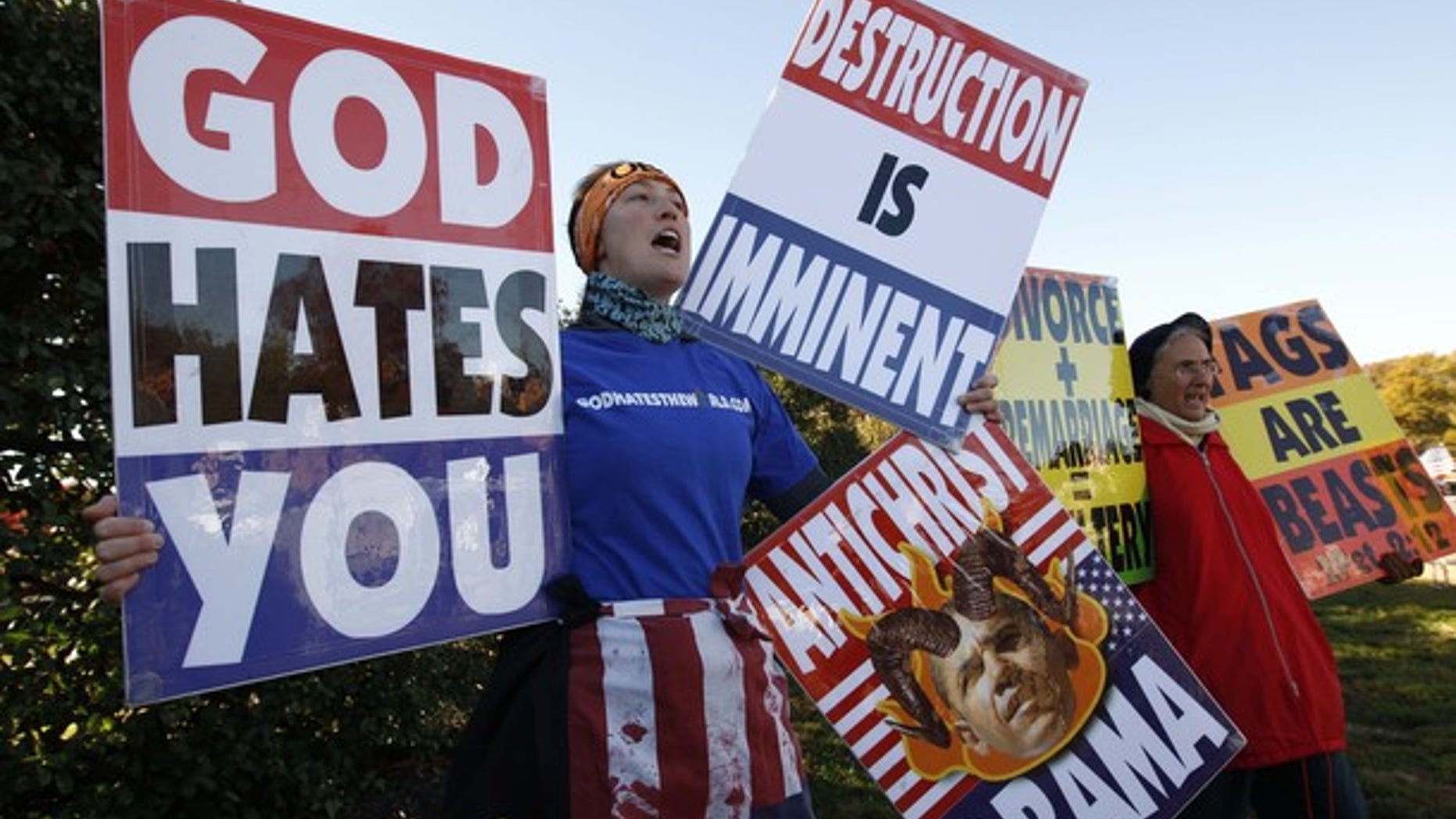 Nov. 11, 2010: Members of the Westboro Baptist Church hold anti-gay signs at Arlington National Cemetery in Virginia on Veterans Day.