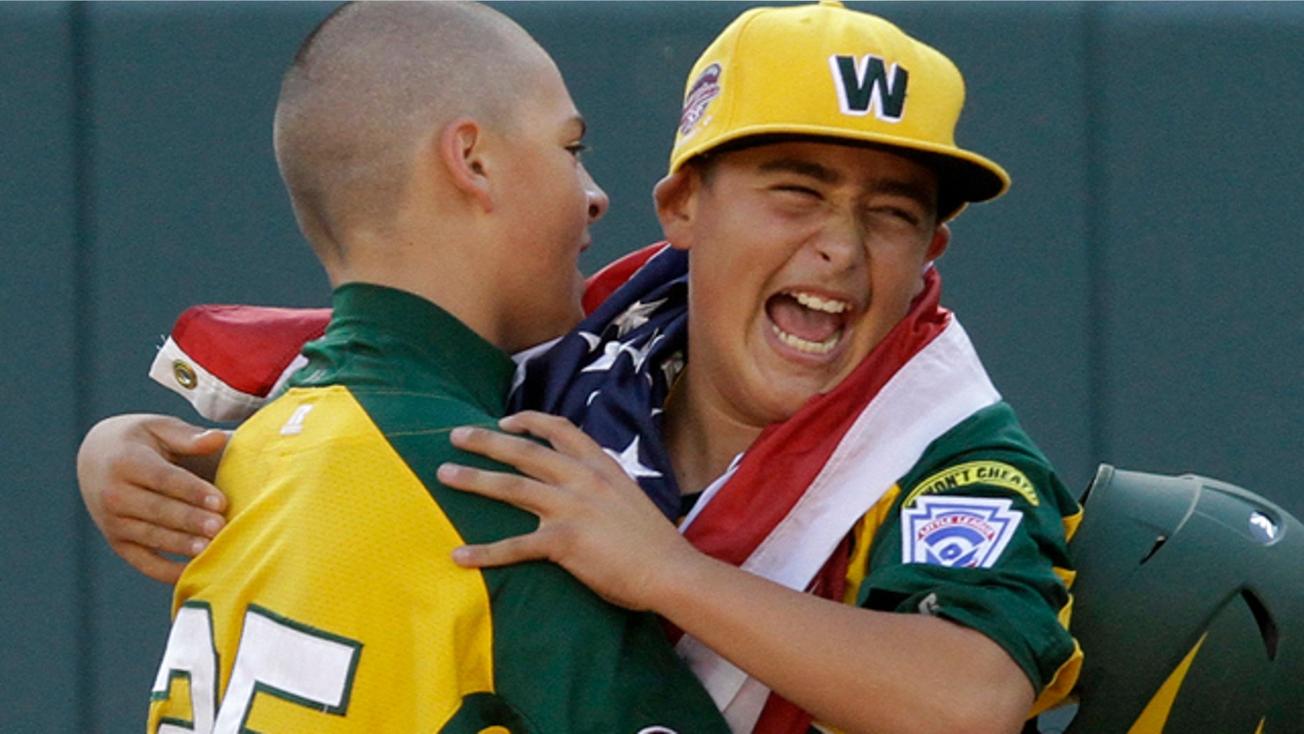 Aug 28: Huntington Beach, Calif.'s Nick Pratto, left, celebrates with teammate Braydon Salzman after driving in the winning run with a walk-off single off Hamamatsu City, Japan, pitcher Kazuto Takakura to win the Little League World Series Championship baseball game in South Williamsport, Pa. California won 2-1. (AP Photo/Gene J. Puskar)
