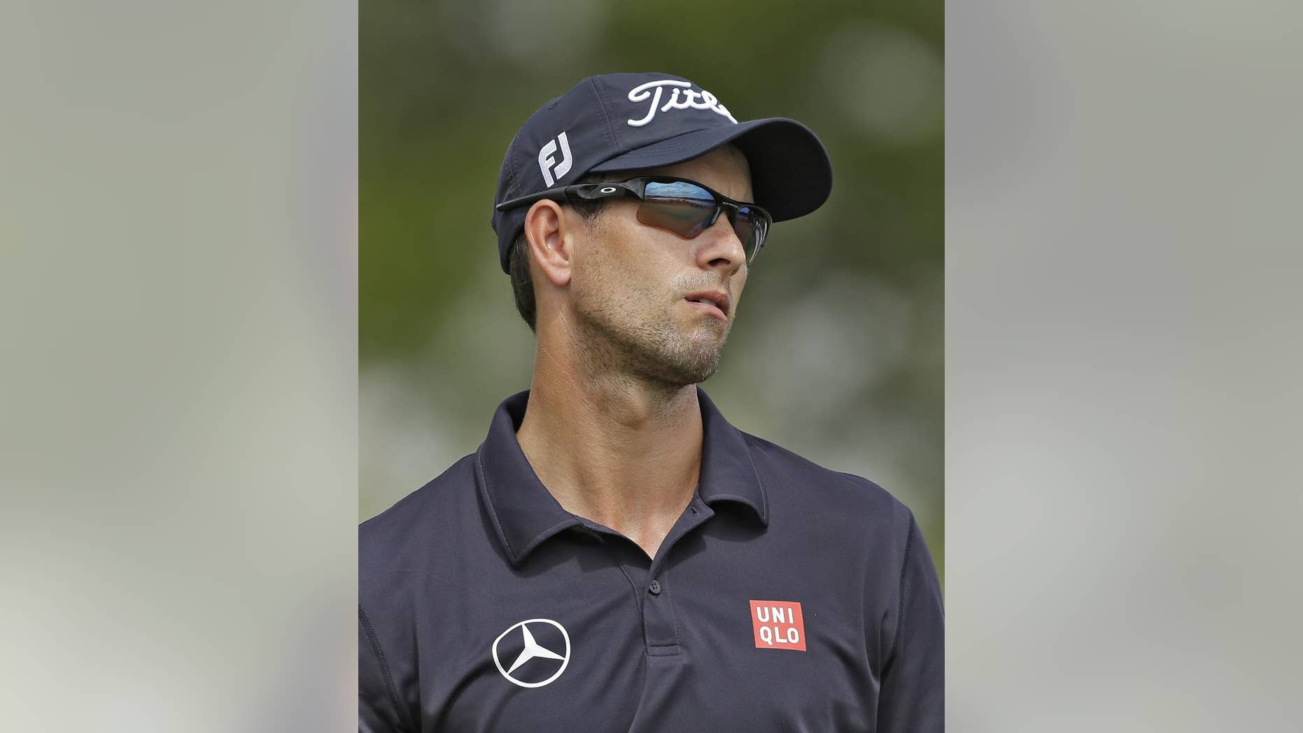 Adam Scott, of Australia, reacts to a missed birdie putt on the fifth hole during the final round of the Arnold Palmer Invitational golf tournament at Bay Hill, Sunday, March 23, 2014, in Orlando, Fla. (AP Photo/Chris O'Meara)