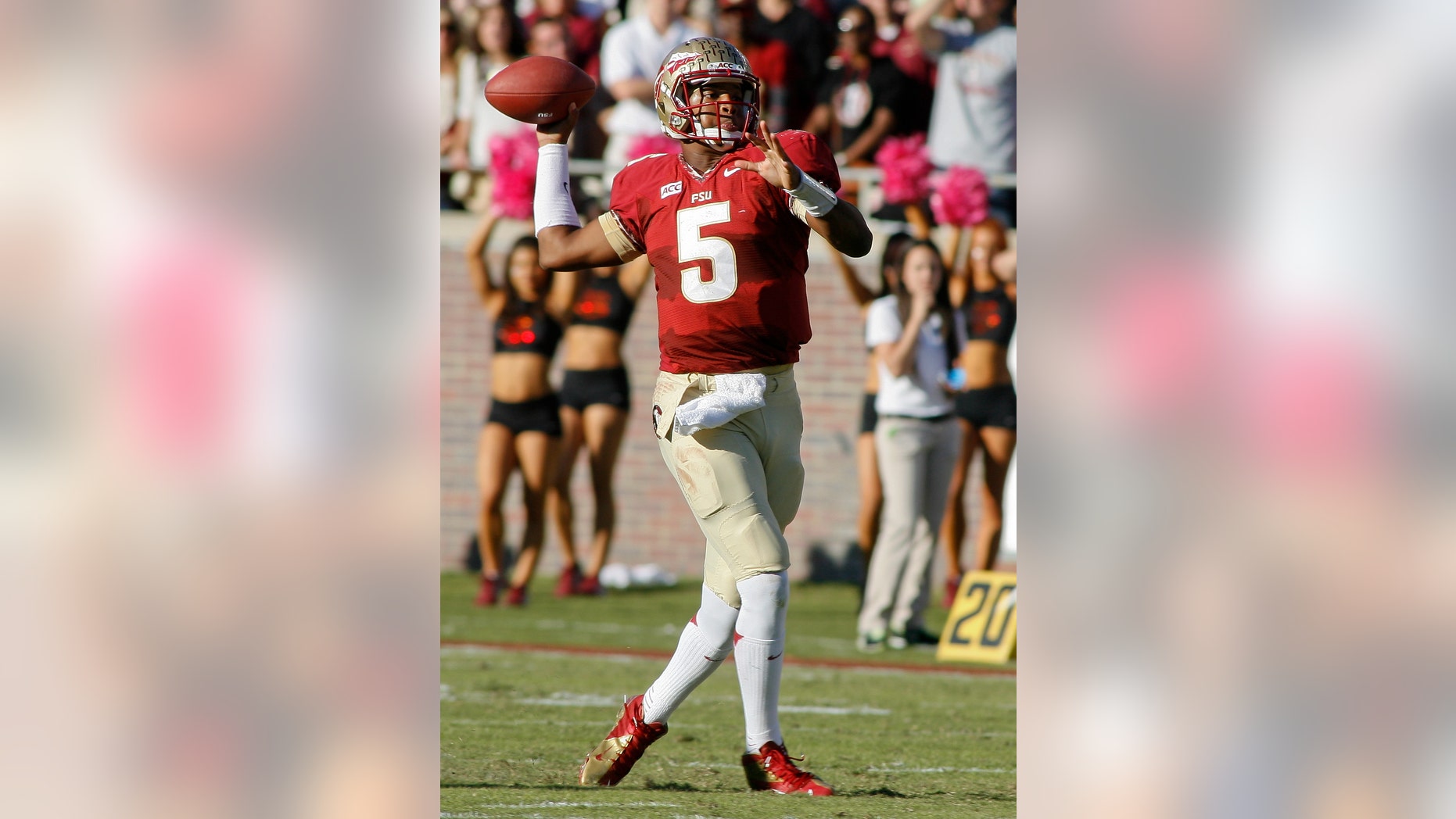 Florida State quarterback Jameis Winston (5) throws in the second quarter of an NCAA college football game against North Carolina State, Saturday, Oct. 26, 2013, in Tallahassee, Fla. (AP Photo/Phil Sears)